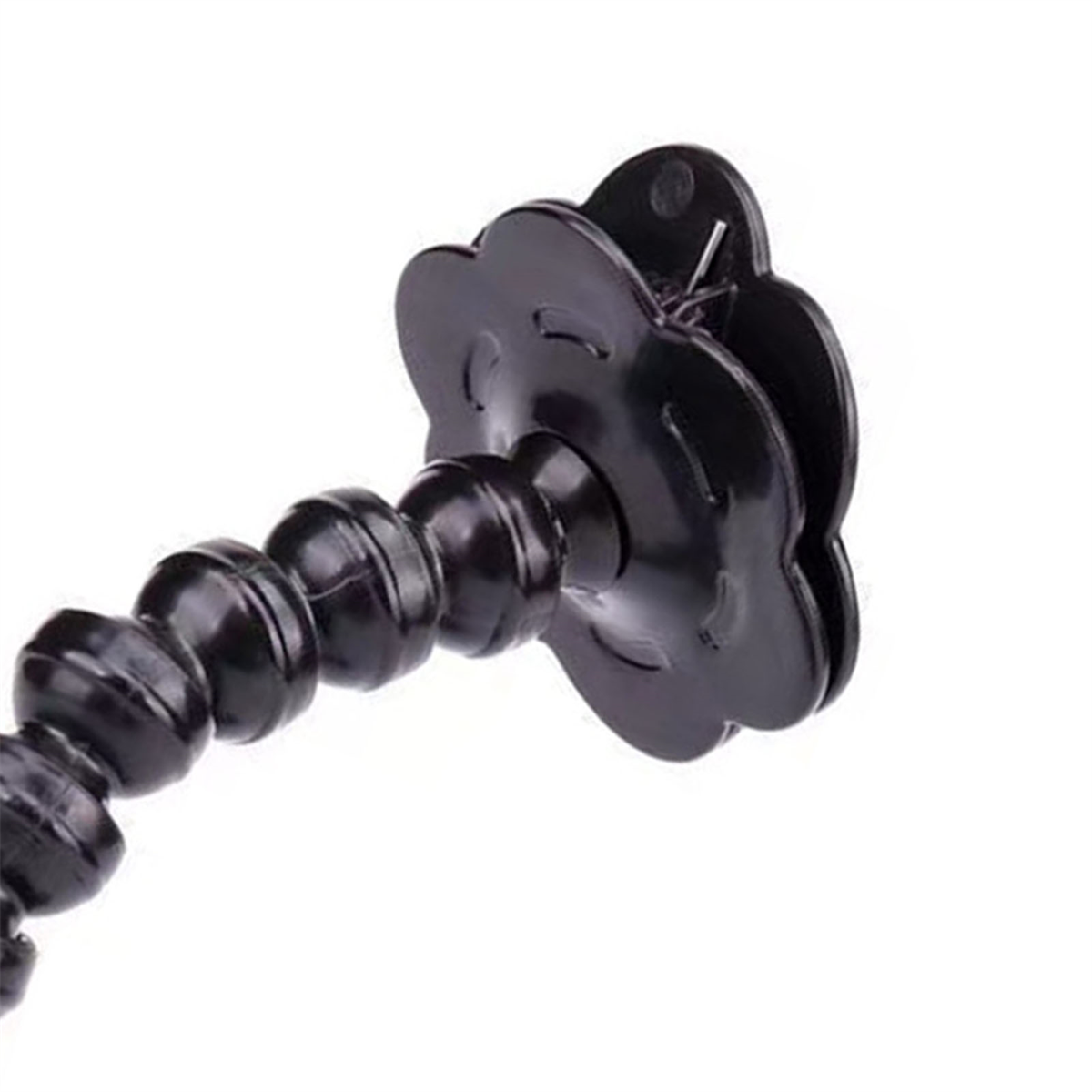 Ein schwarzer flexibler Arm mit blütenförmigem Aufsatz.