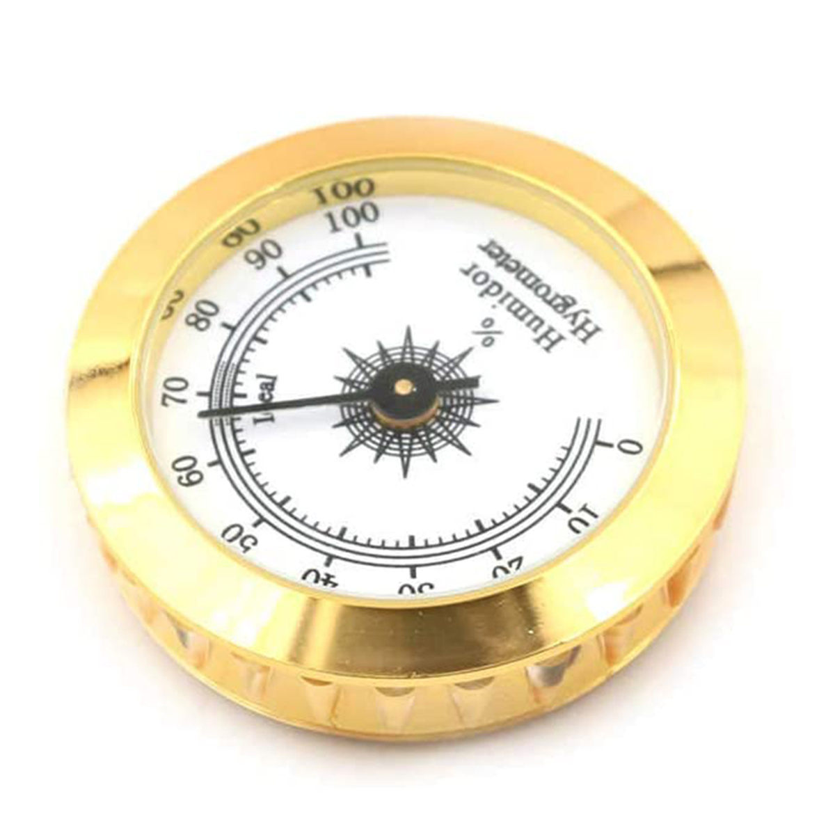 Goldgerahmtes, kreisförmiges Hygrometer mit weißem Zifferblatt und Nadel, die die Luftfeuchtigkeit anzeigt.