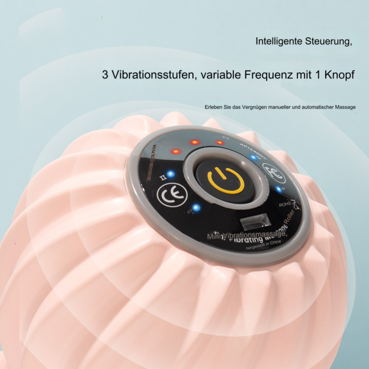 Rosa Vibrationsmassagegerät. Oben Steuertasten und Lichter. Text lautet 'Mini Vibrationsmassage'.