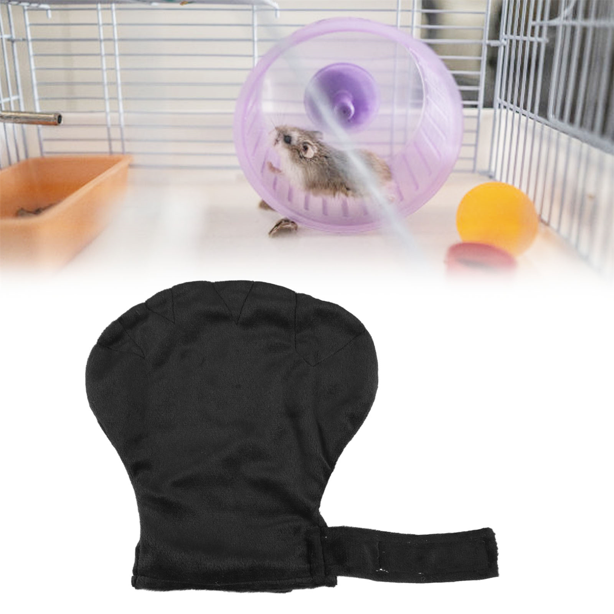 Ein Hamster im Rad, ein schwarzer Handschuh und ein orangefarbener Ball in einem Käfig.