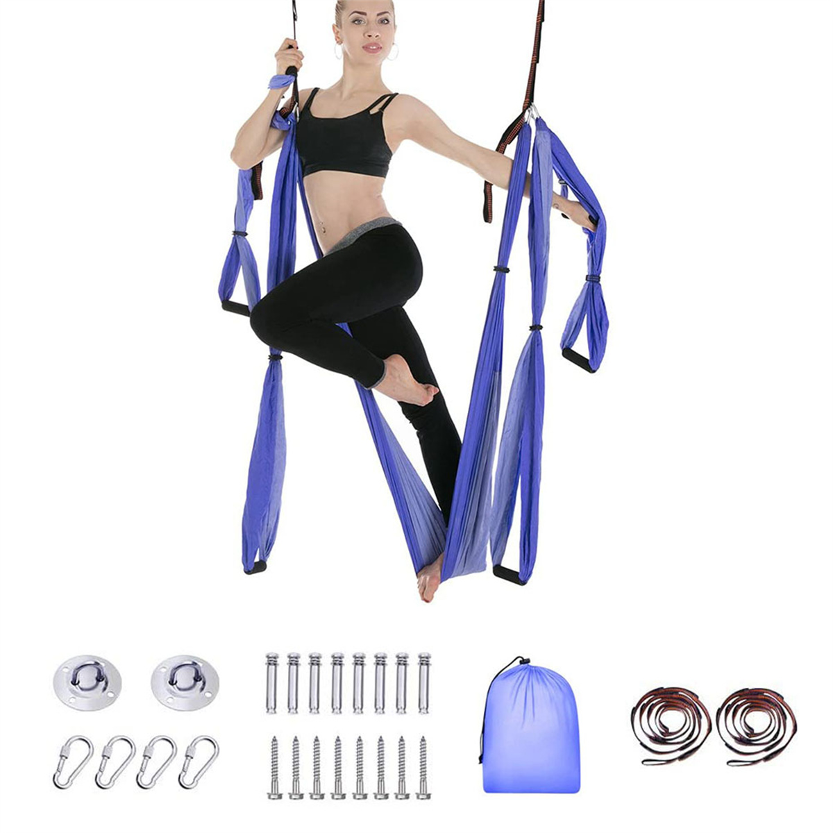 Frau in schwarzer Trainingskleidung, die Aerial Yoga mit lila Stoff und hängendem Zubehör macht.