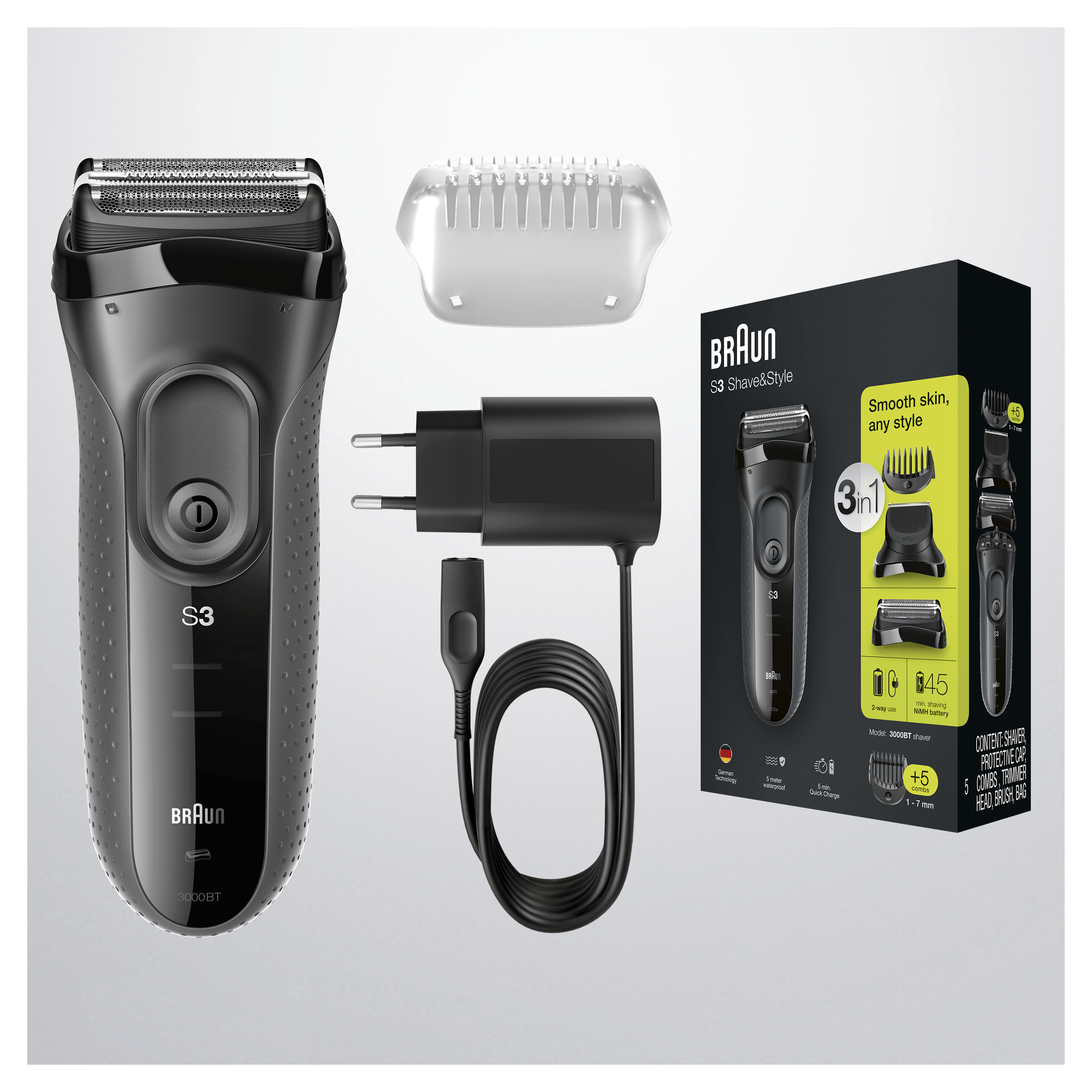 Set rasoio Braun nero con accessori. Sfondo bianco. Rasoio, caricatore, rifinitore.