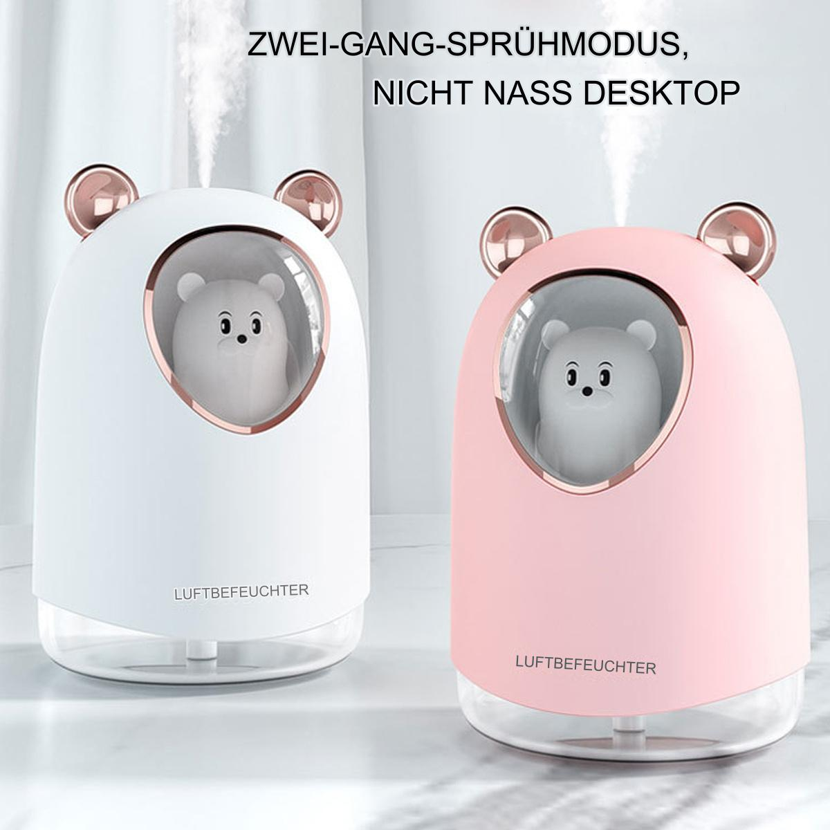 Zwei Bären-Luftbefeuchter, einer weiß, einer rosa, mit einer Bärenfigur im Inneren. Text ist sichtbar.