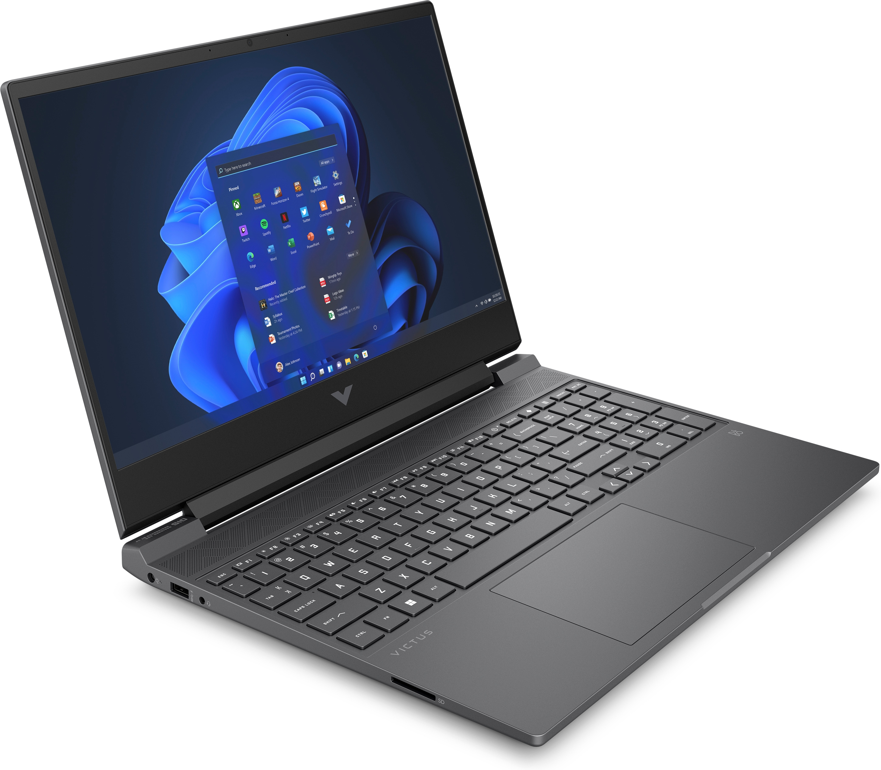 Laptop on a white surface, open, displaying a Windows interface. The screen is black and the keyboard is visible.