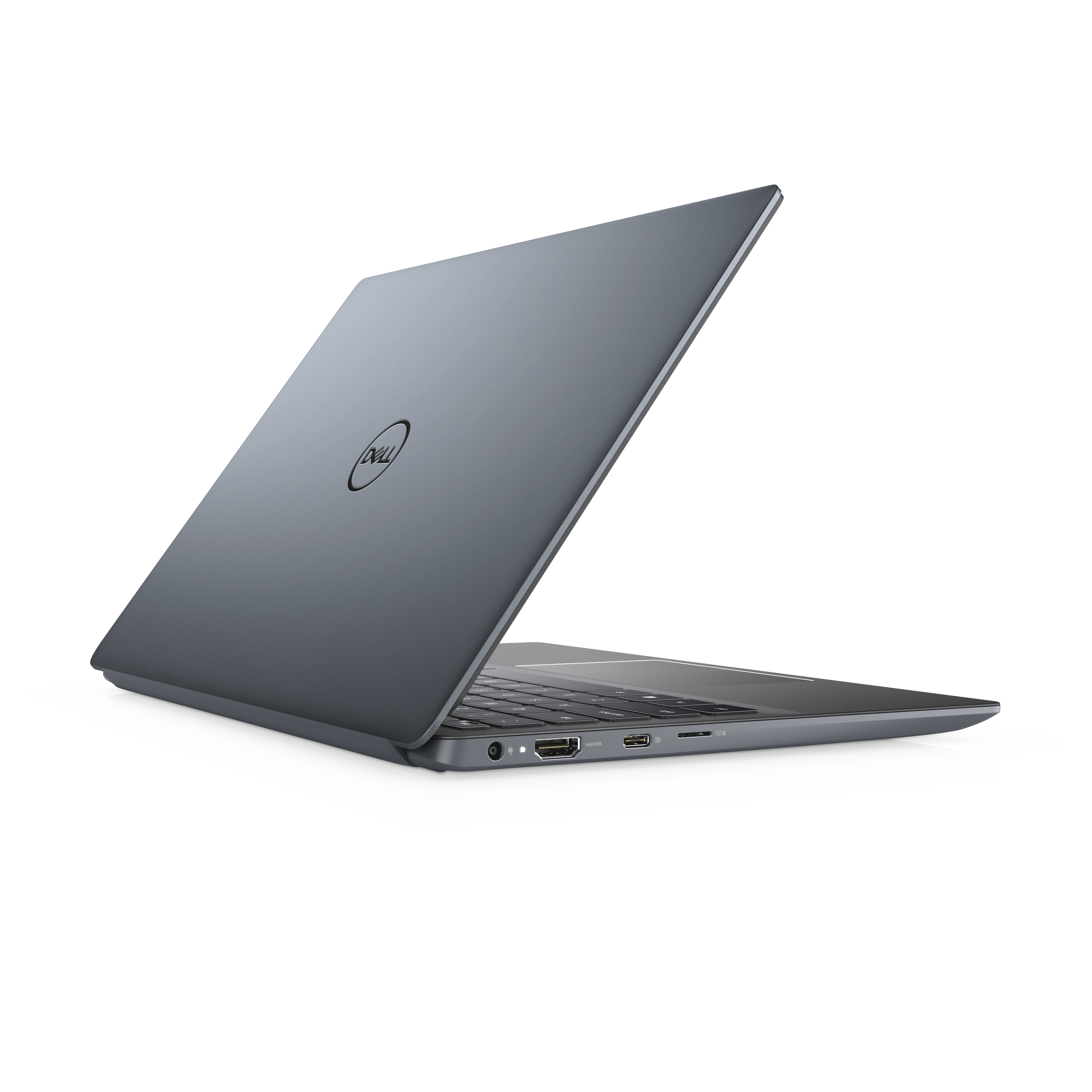Laptop Dell grigio scuro, aperto, con tastiera visibile, su superficie bianca, angolato.