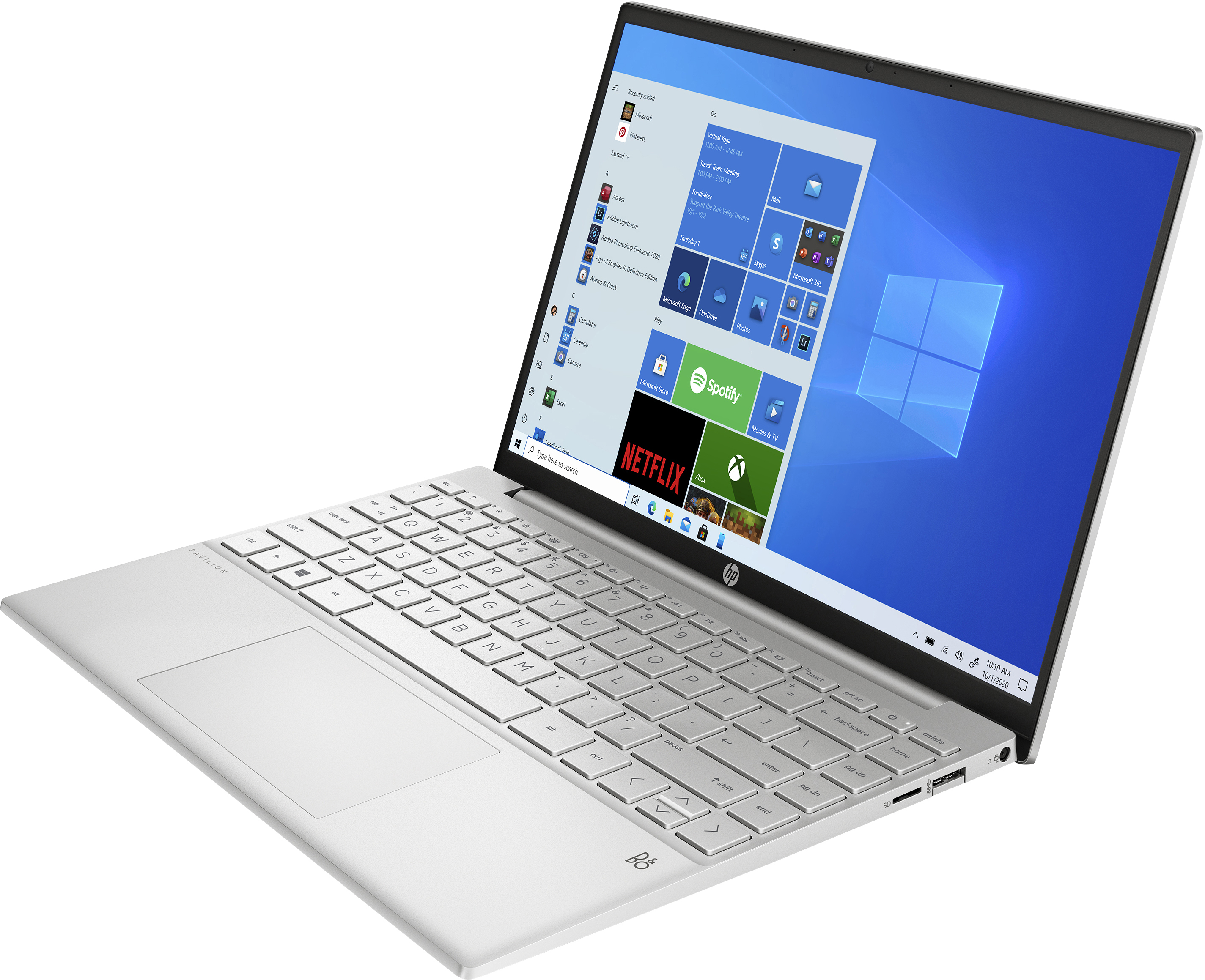Laptop argento, aperto, che mostra l'interfaccia di Windows 10. Logo HP visibile. Messa a fuoco sulla tastiera.