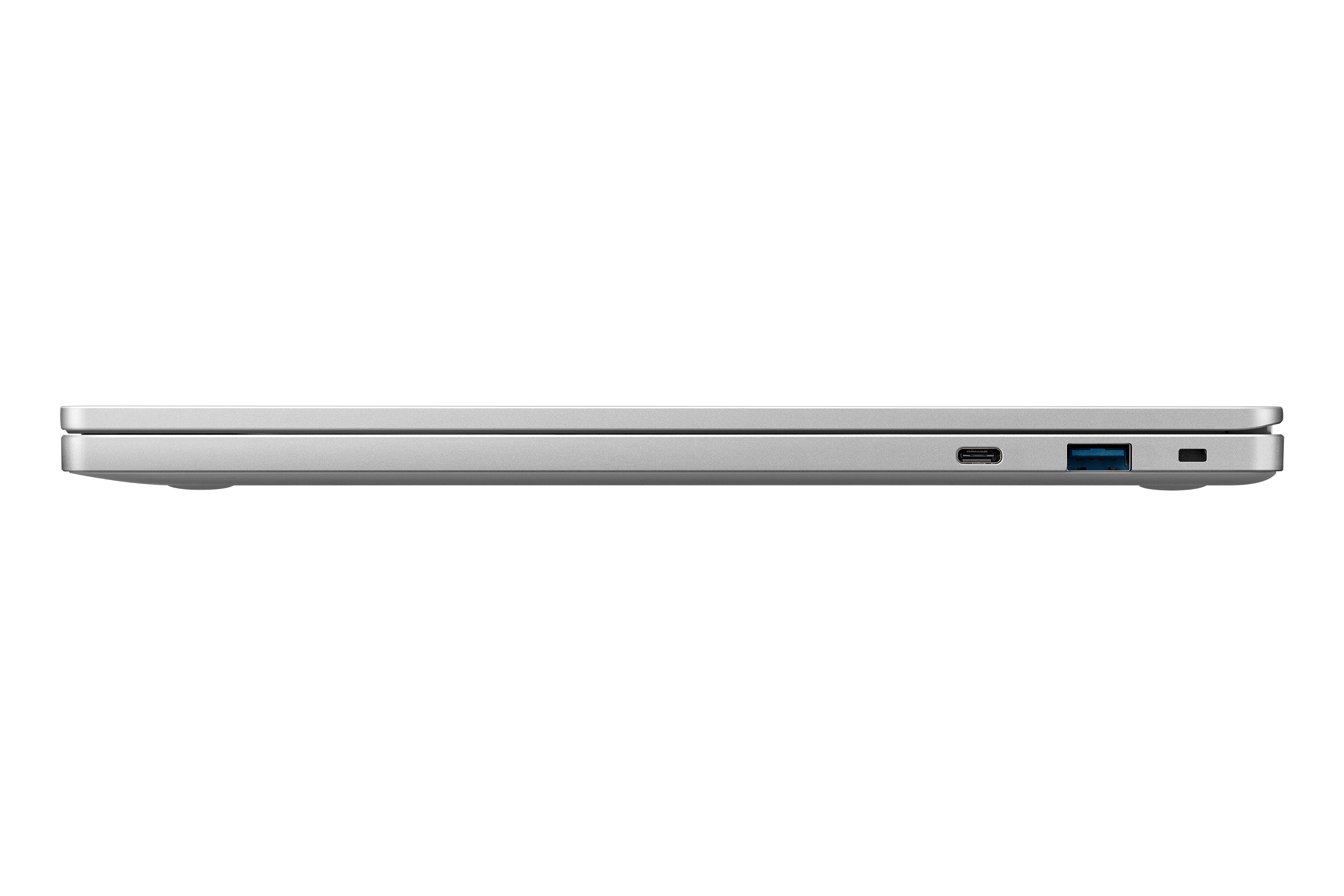 Laptop argentato, chiuso e inclinato. Il profilo laterale mostra le porte e una porta USB-C.