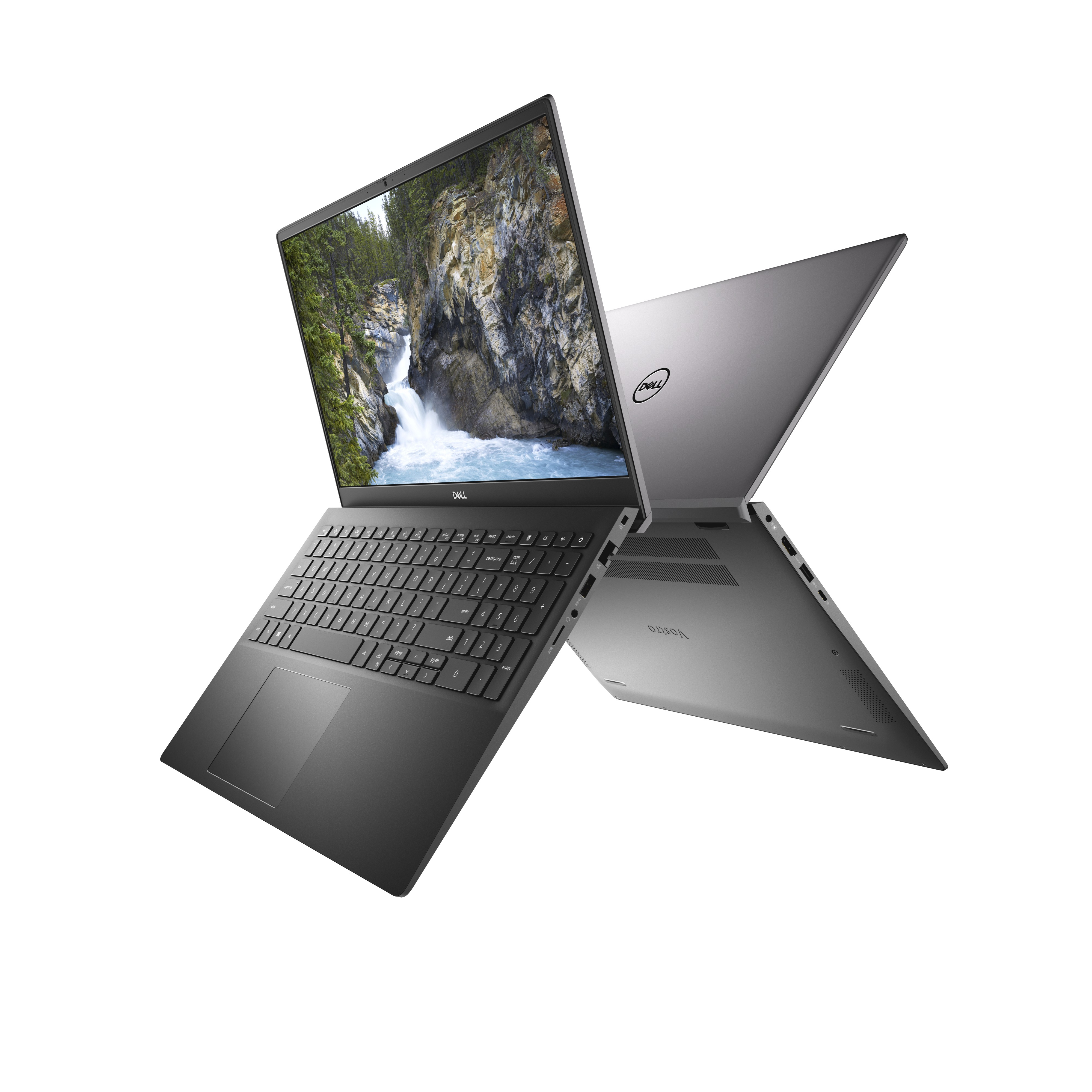 Due laptop, uno aperto e uno chiuso, con una cascata sullo sfondo.