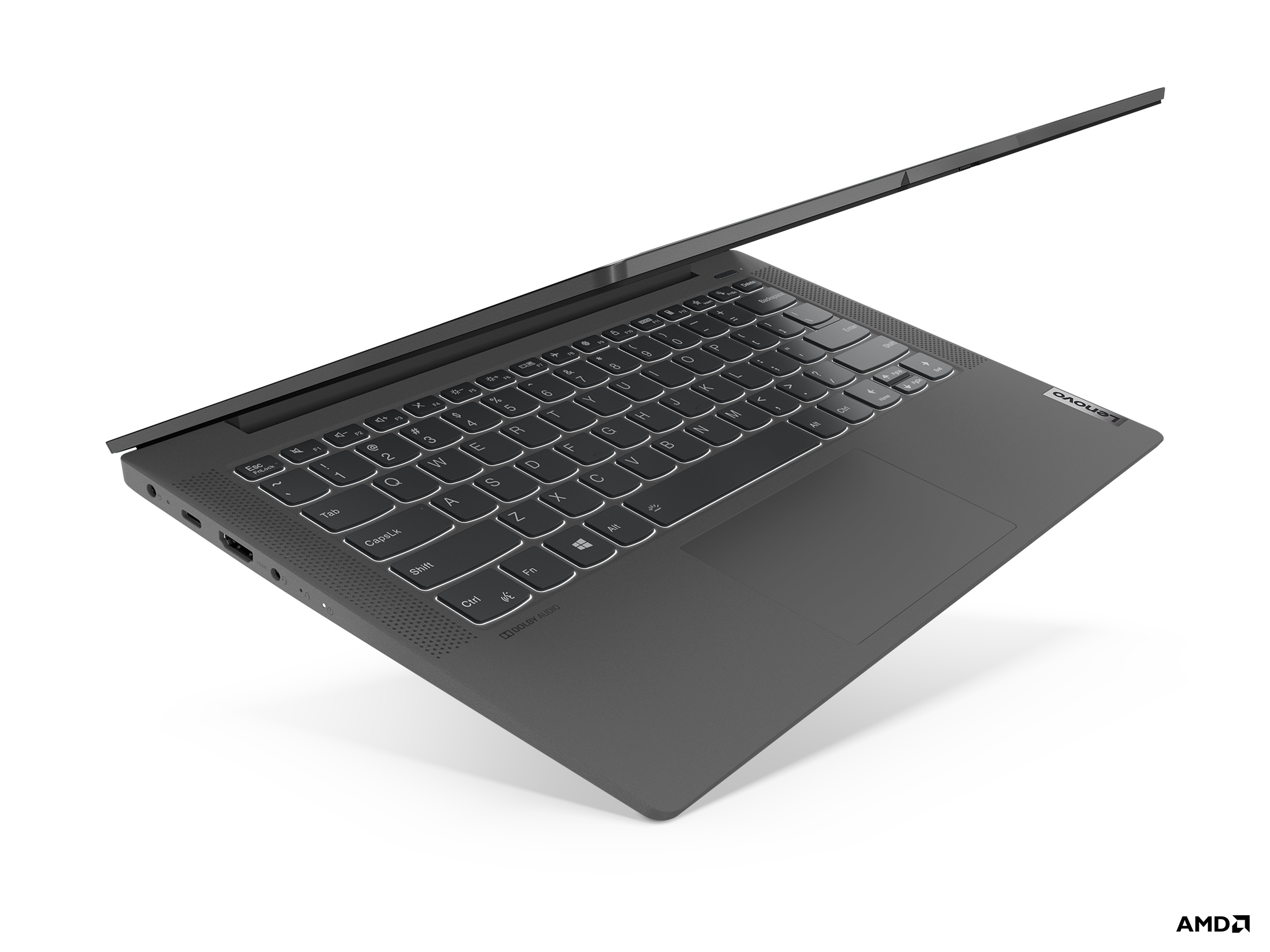 Laptop Lenovo, aperto. La tastiera ha tasti bianchi. Logo AMD a destra.