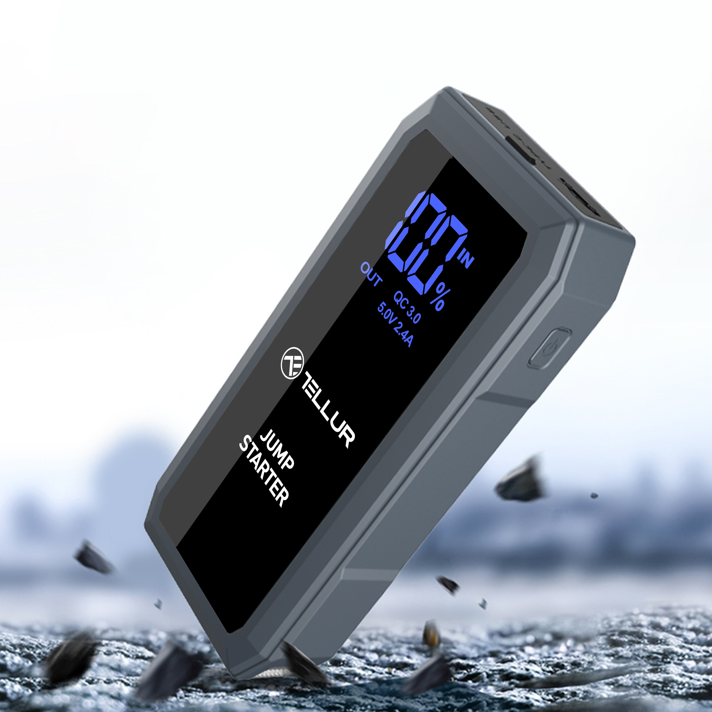 Szary rozrusznik z cyfrowym wyświetlaczem. Podłoże jest szorstkie.