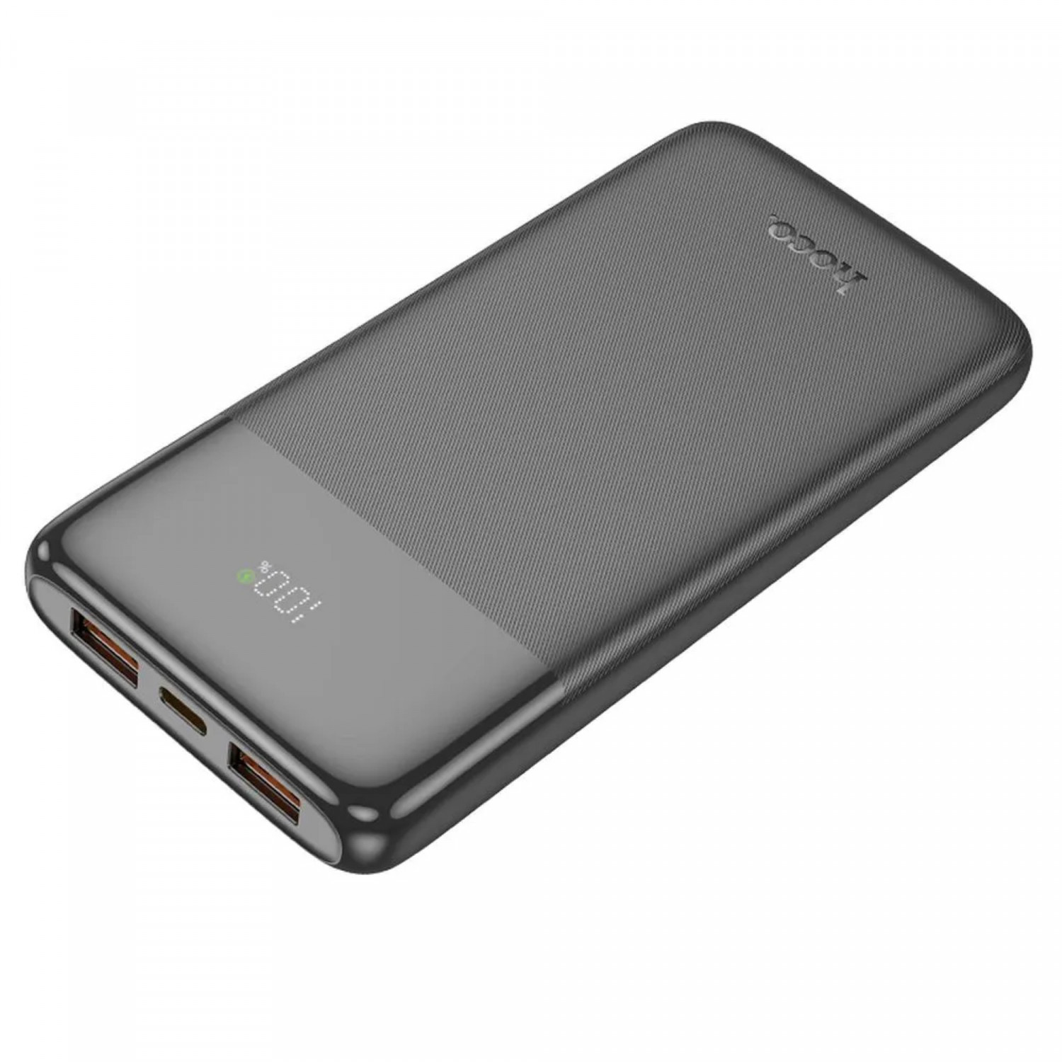 Eine dunkelgraue Powerbank mit digitaler Anzeige, die 100 % Ladung anzeigt, schräge Ansicht.