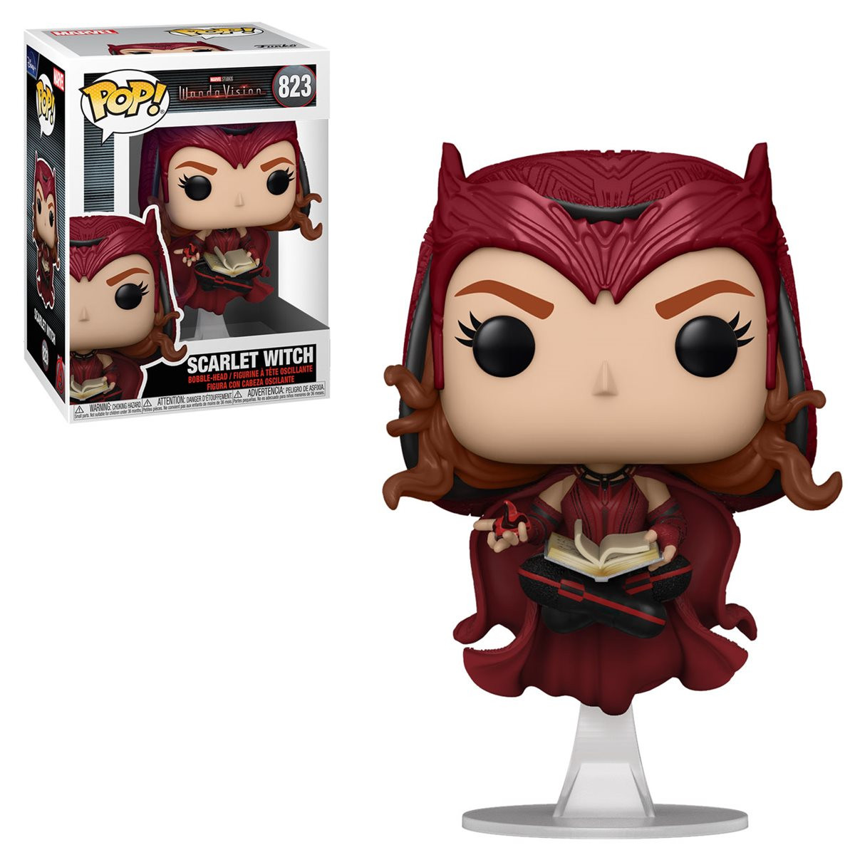 Scarlet Witch Funko Pop Figur mit Box. Sie trägt ein rotes Kostüm und hält ein Buch. Weißer Hintergrund.