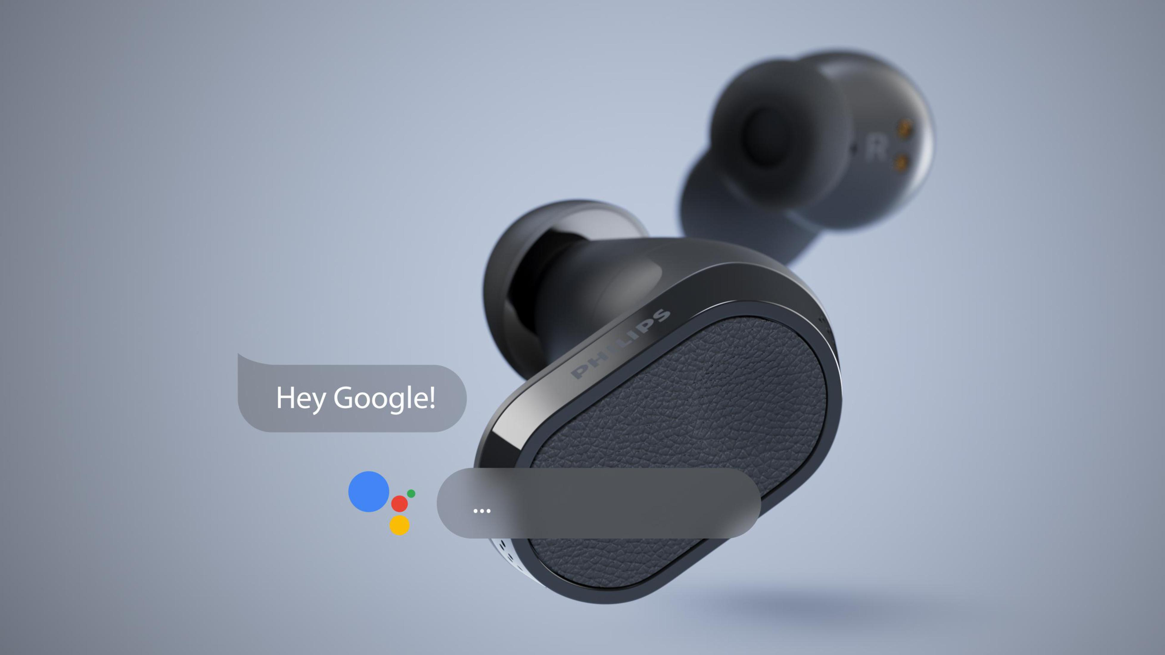 Auriculares negros con una burbuja de diálogo que dice '¡Hey Google!' y el logo de Google Assistant.