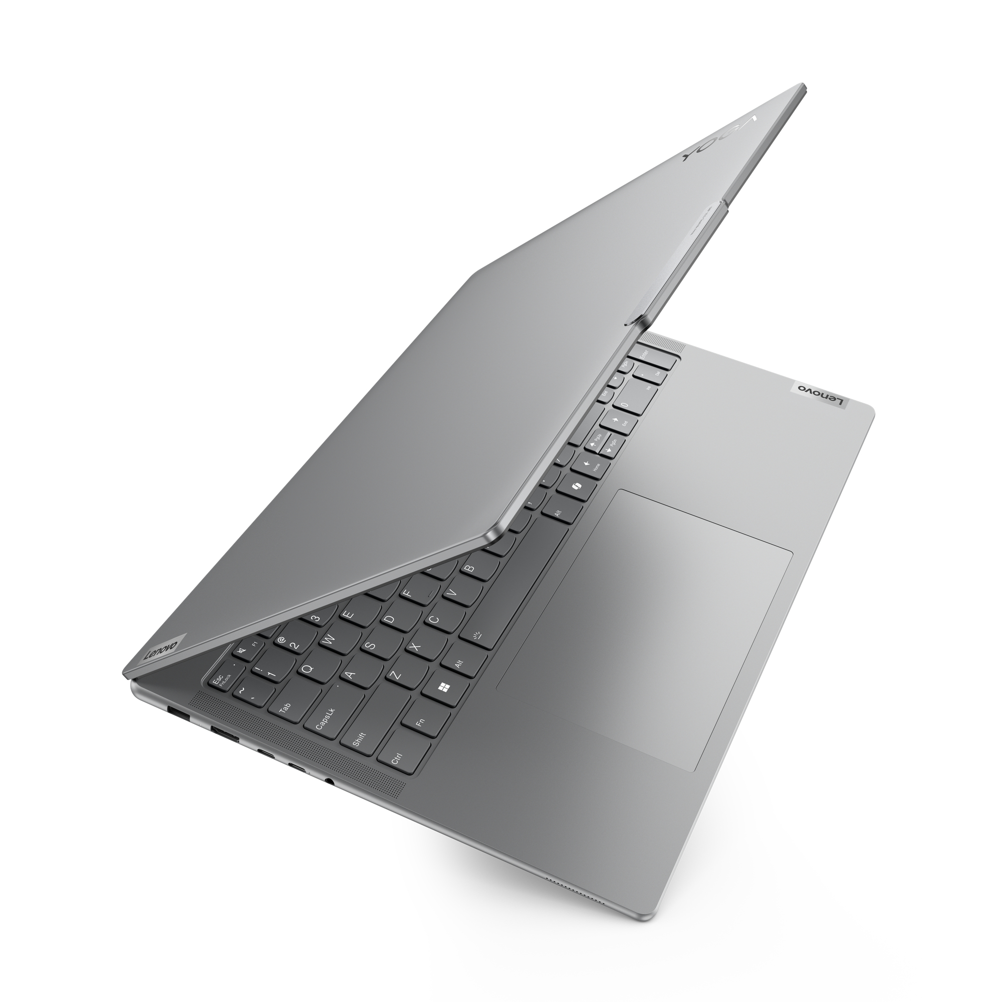 Silberner Laptop mit offenem Bildschirm, Tastatur sichtbar.