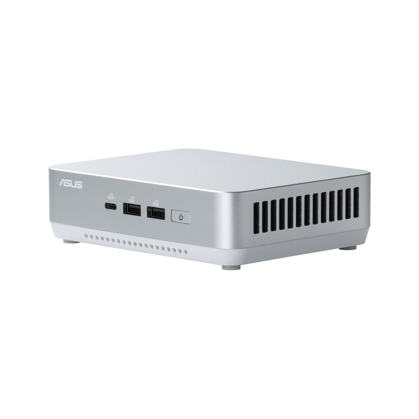 Srebrny mini PC z białą podstawą, czarnymi portami i wentylacją. Białe tło.