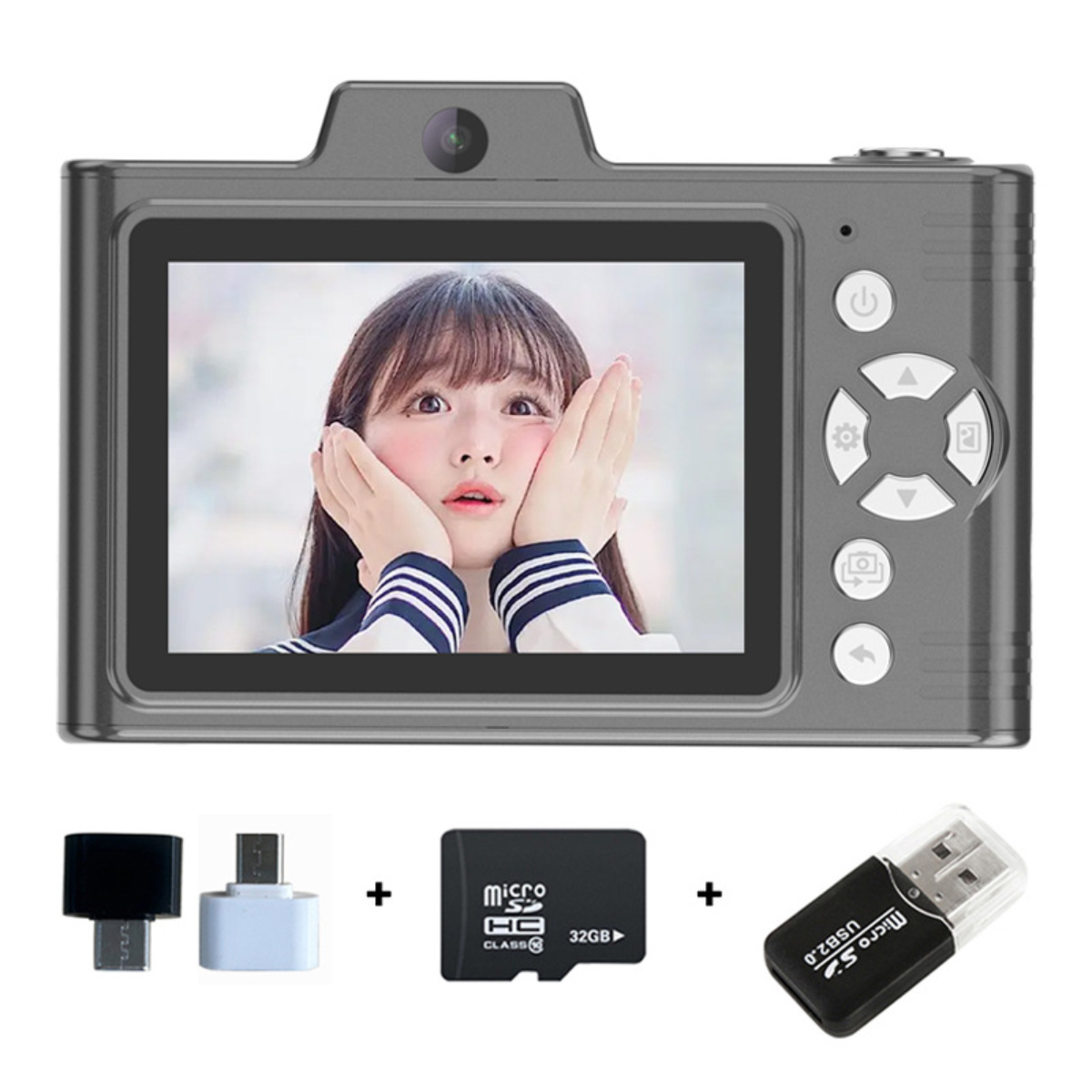 Eine graue Digitalkamera mit einem Frauengesicht auf dem Bildschirm. Zubehör: Adapter und SD-Karte.