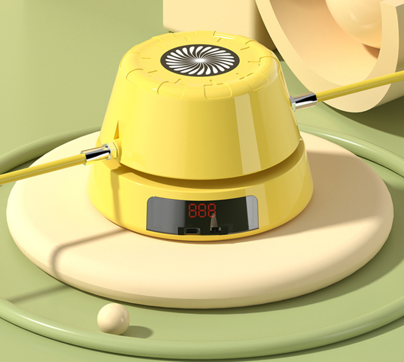 Gelbes Springseilgerät mit Digitalanzeige, auf einer cremefarbenen Plattform, mit einem kleinen weißen Ball daneben.