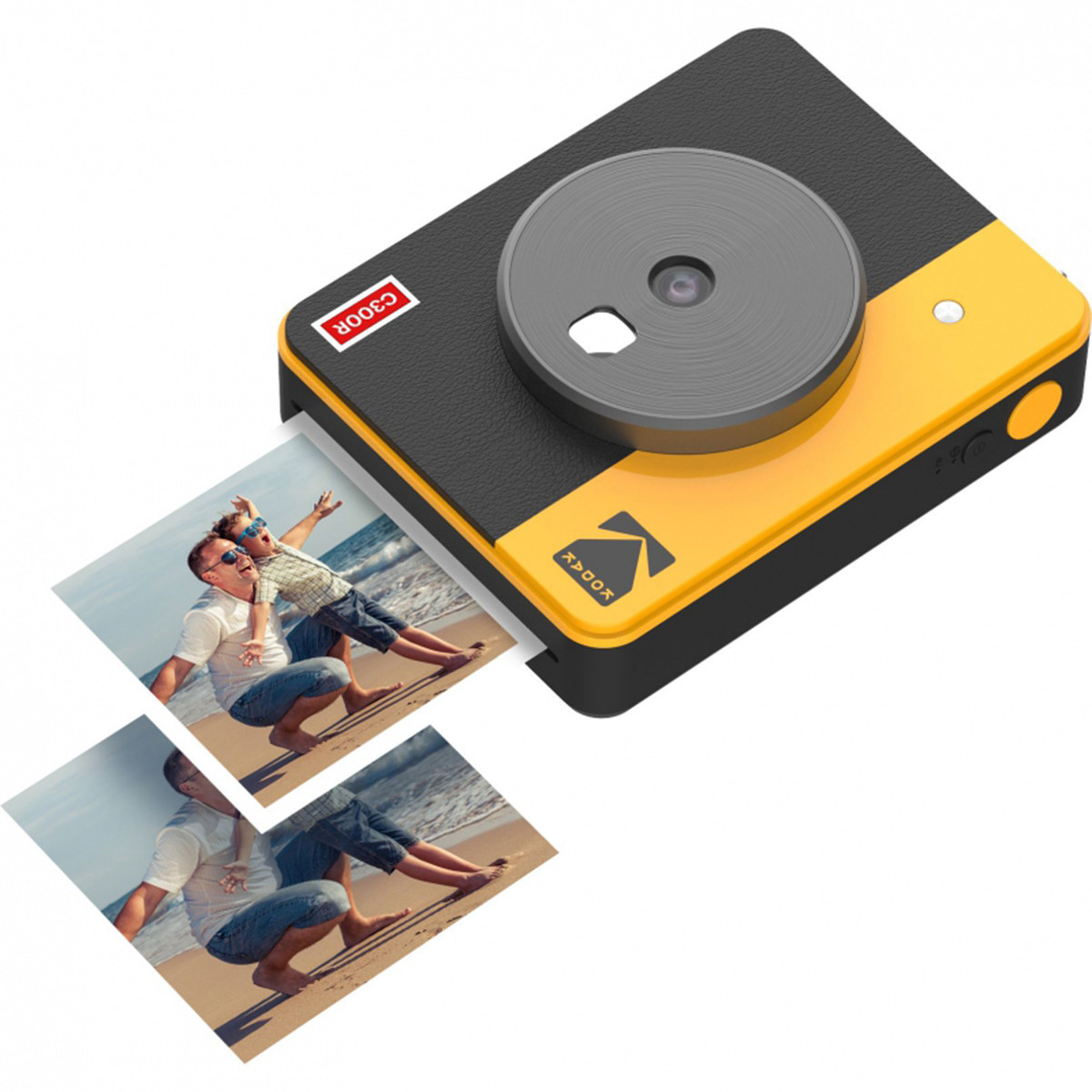 Gelbe und schwarze Kamera, die Fotos druckt. Zwei Fotos kommen aus der Kamera.