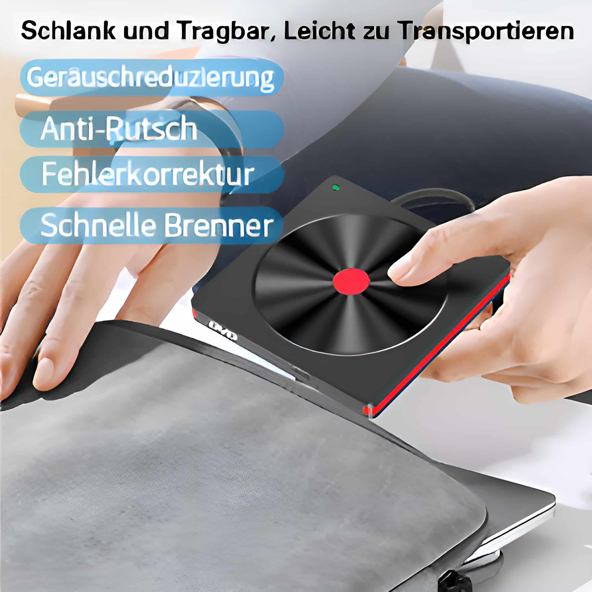 Tragbarer DVD-Brenner auf einem Laptop, mit rot akzentuiertem Design und einer Hand, die ihn hält.