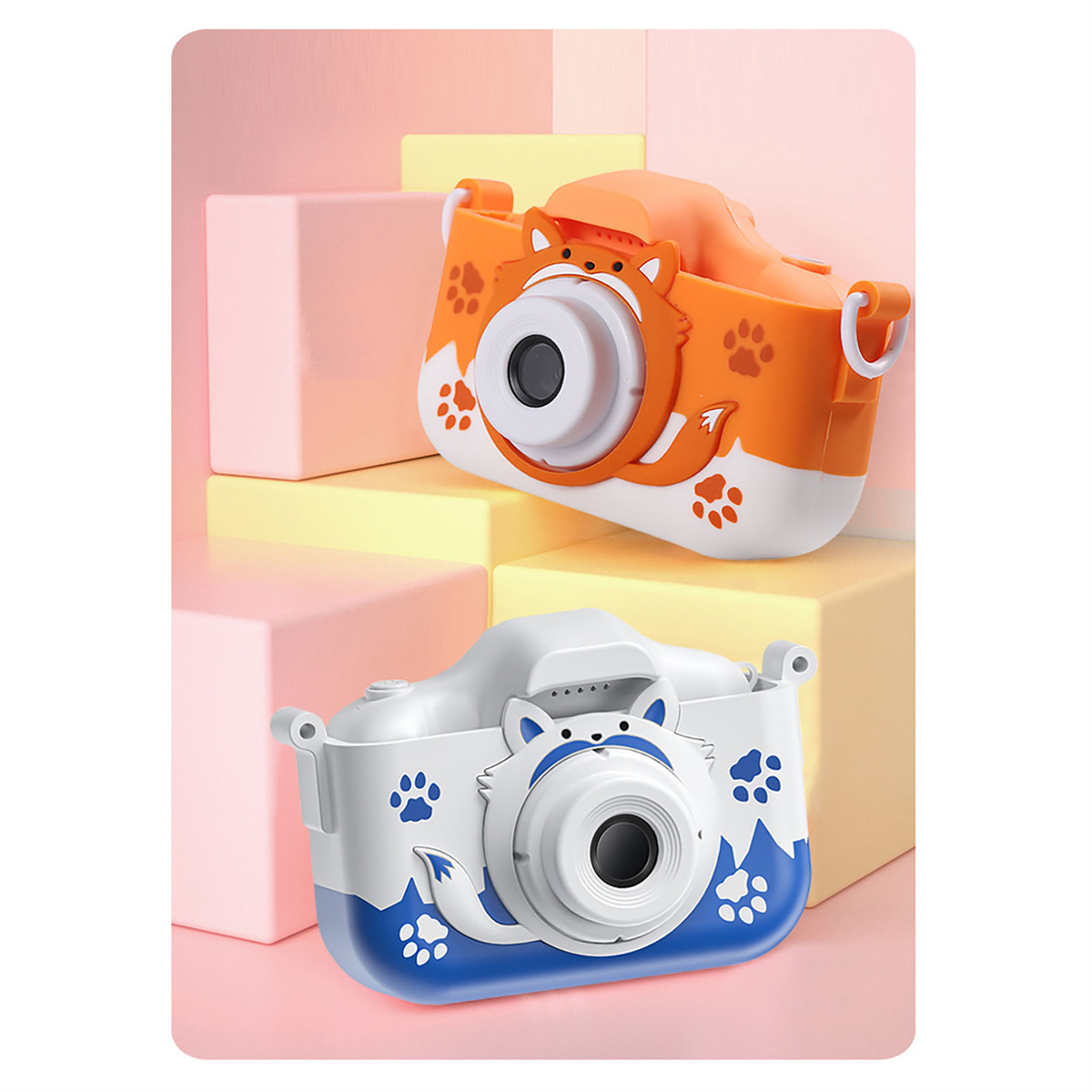 Zwei Spielzeugkameras, orange und blau. Jede hat ein Fuchsgesicht-Design und Pfotenabdrücke.