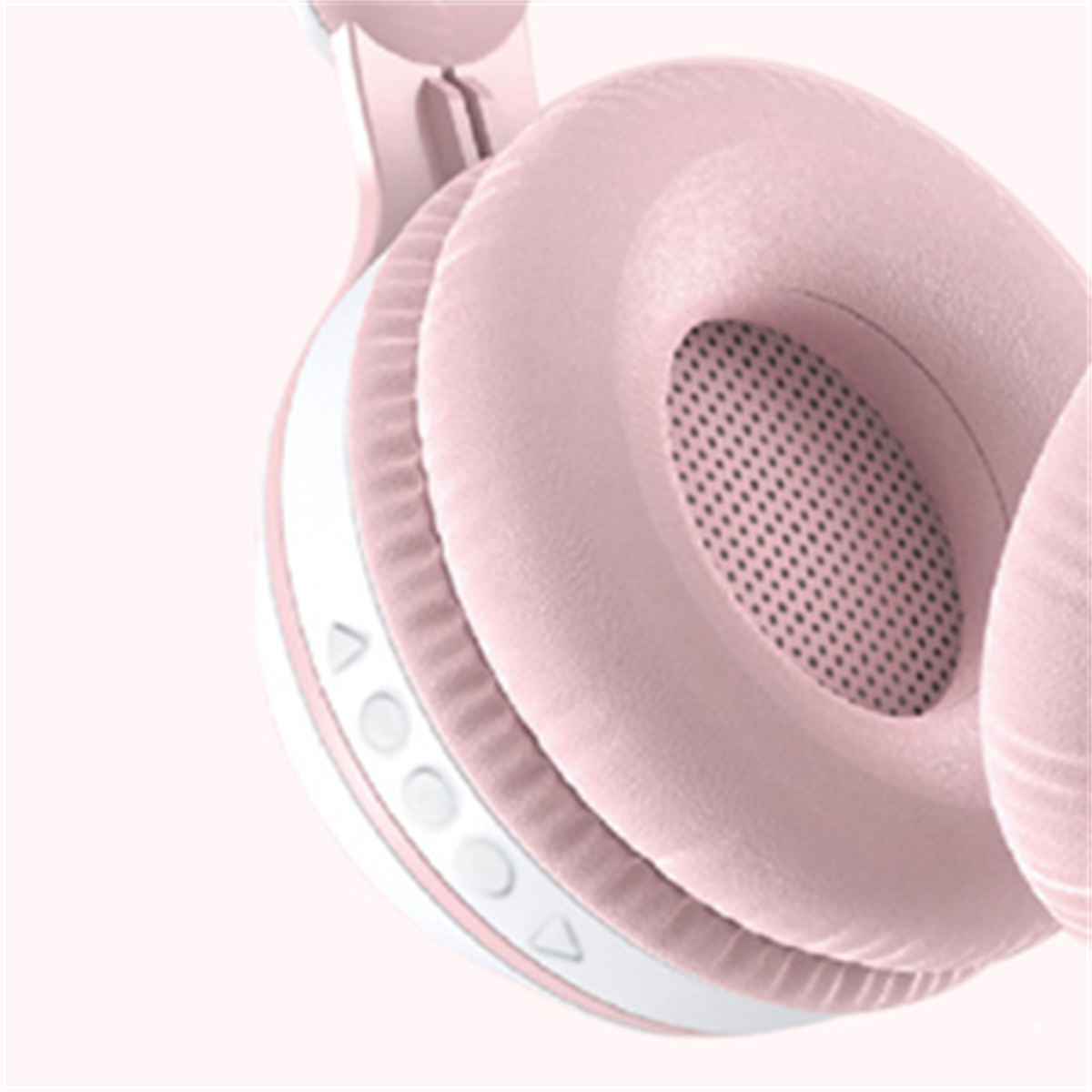 Nahaufnahme von rosa Kopfhörern mit Ohrmuscheln und Steuertasten.