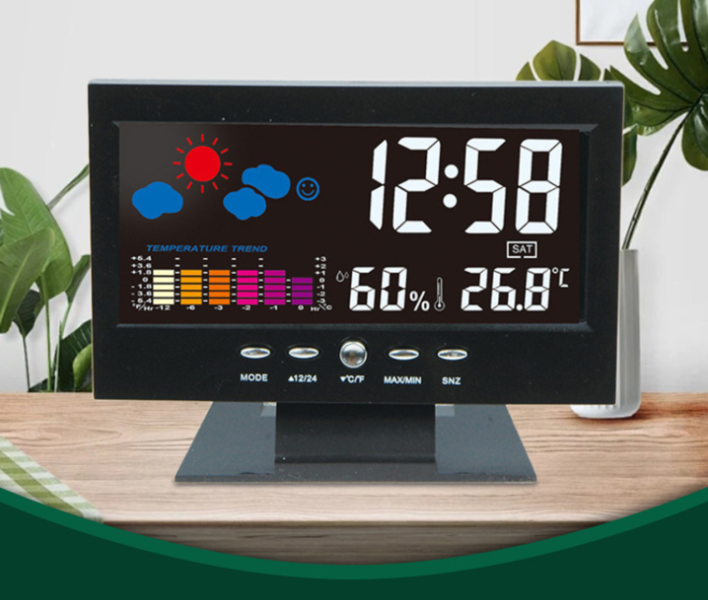 Digitaler Wecker mit Anzeige von Uhrzeit, Wetter und Temperaturtrend.