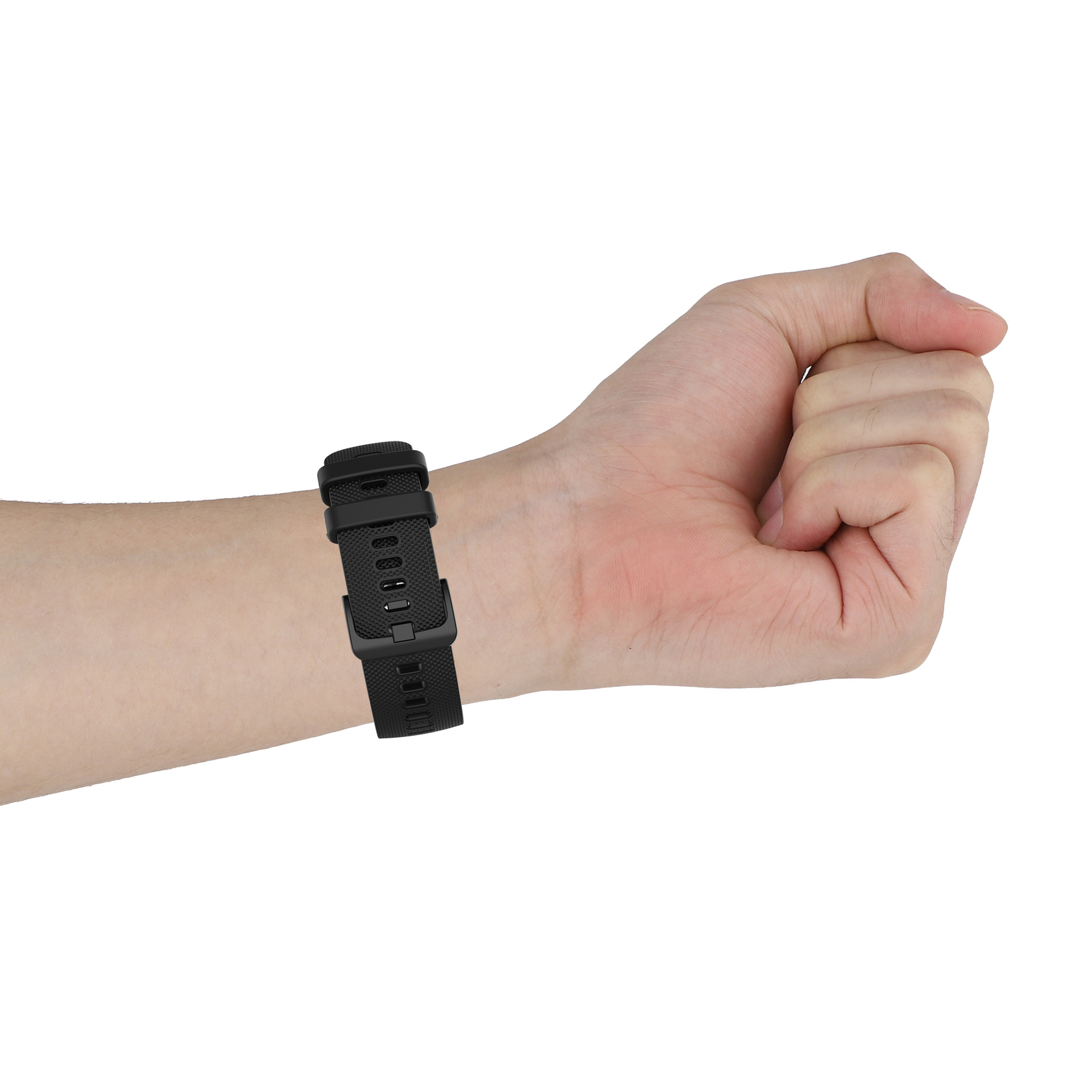 Ein schwarzes Uhrenarmband am Handgelenk einer Person. Das Band ist verbunden und befestigt.