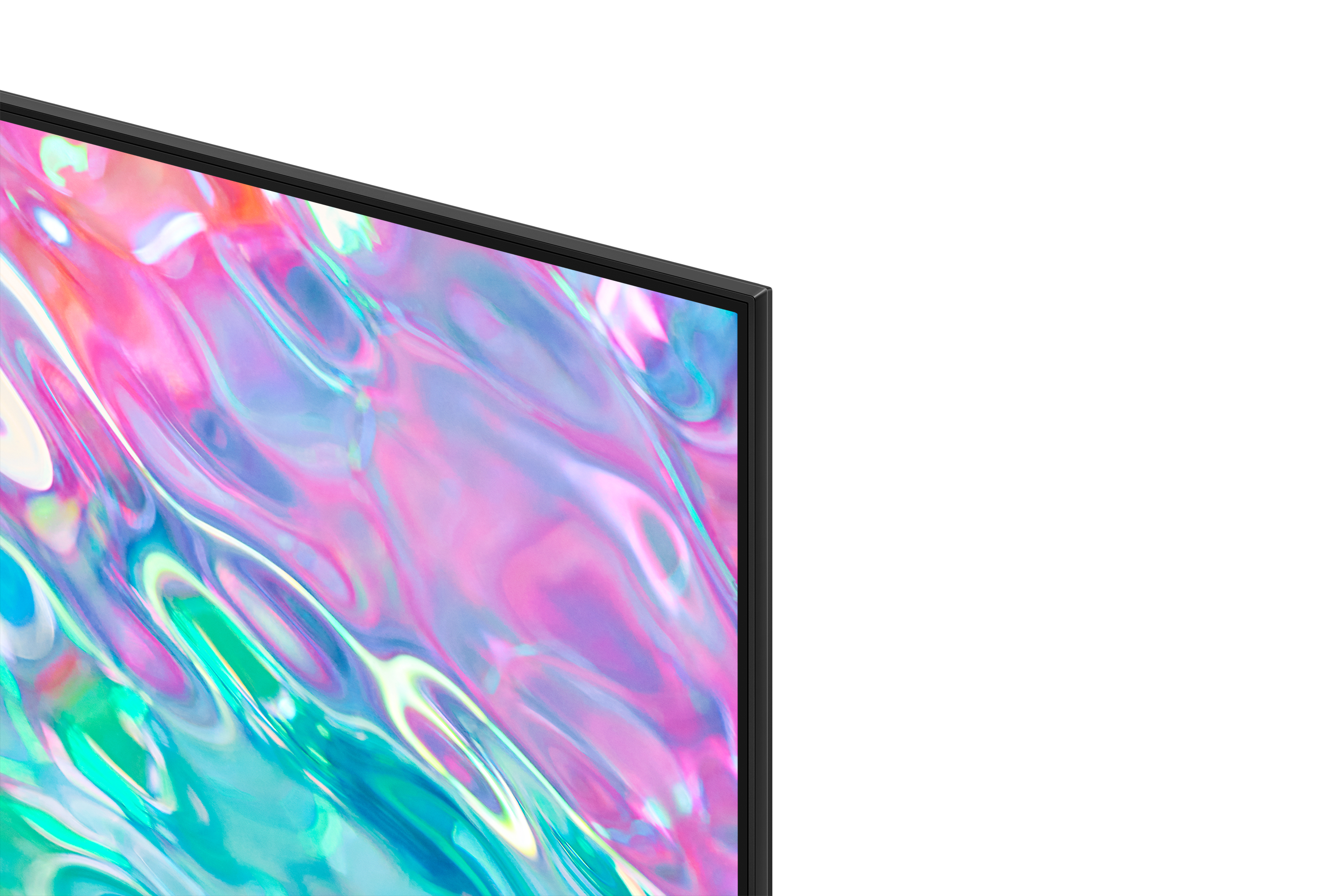 Zbliżenie ekranu telewizora z czarną ramką. Ekran wyświetla mieszankę kolorów.