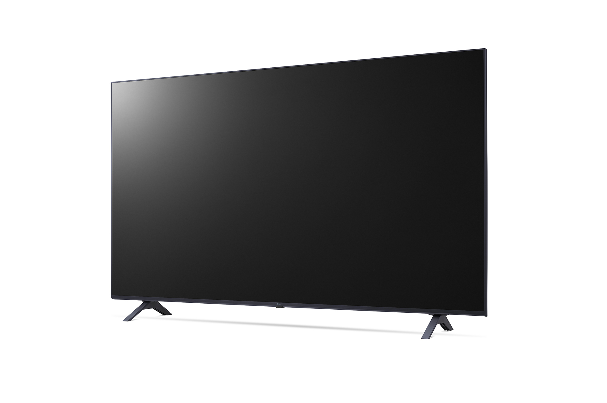 Televisor negro grande sobre fondo blanco, vista en ángulo. Dos patas negras pequeñas sostienen la pantalla.