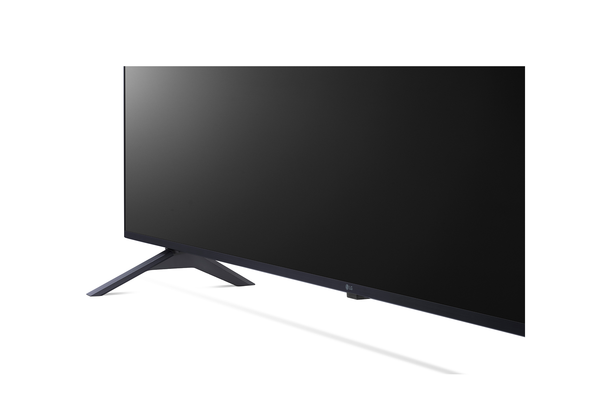 Televisor LG negro, vista lateral, patas anguladas. Pantalla negra. Fondo blanco.