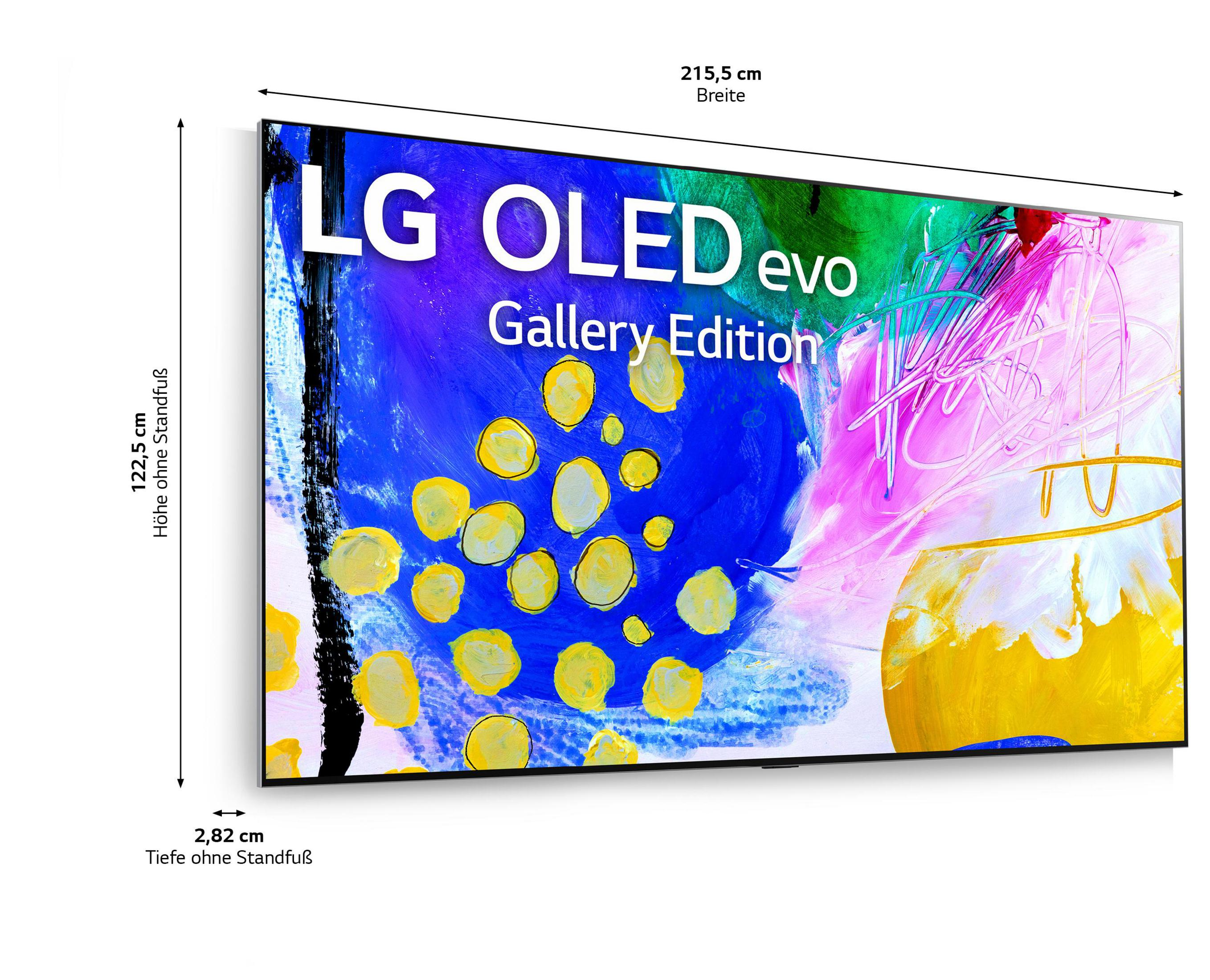 Grande TV LG OLED con display artistico colorato, sfondo bianco.