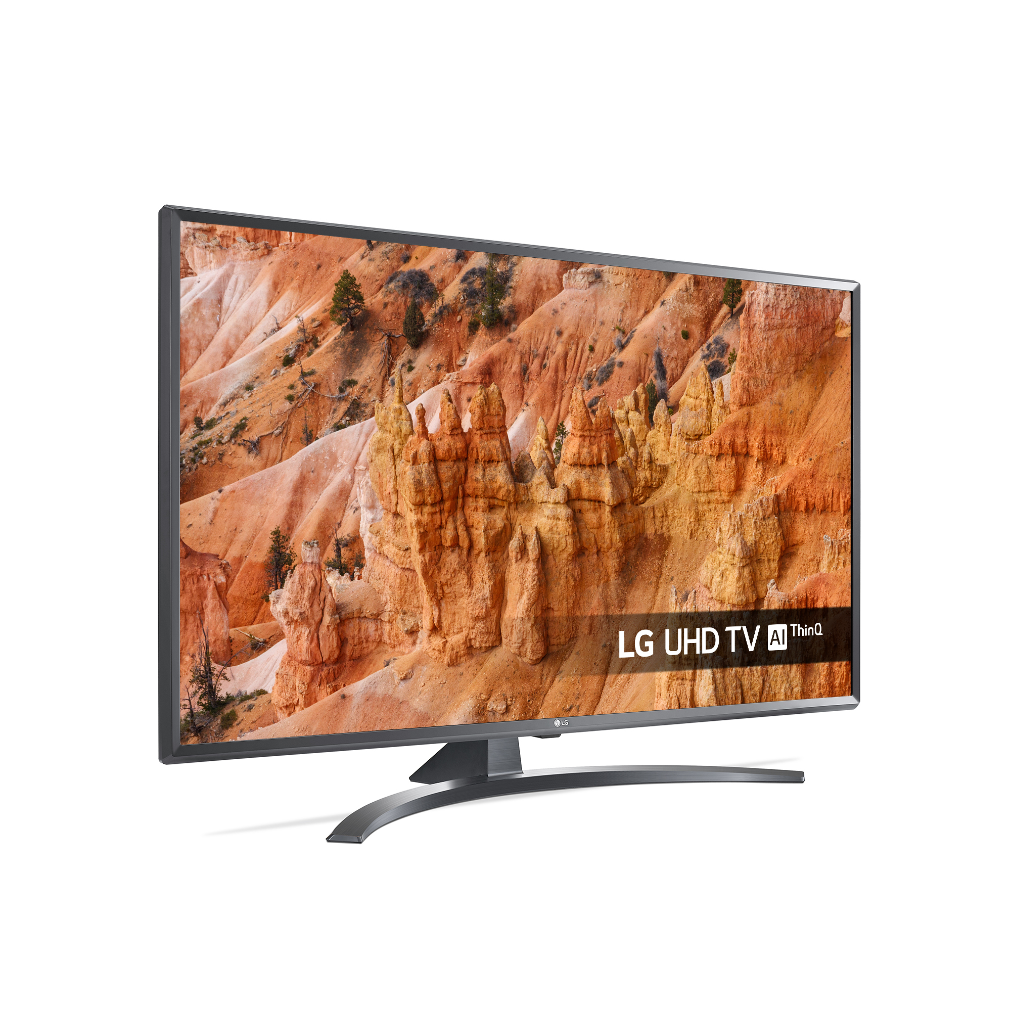 TV LG UHD con base curva che mostra un paesaggio di canyon. Schermo con logo LG UHD TV AI ThinQ.