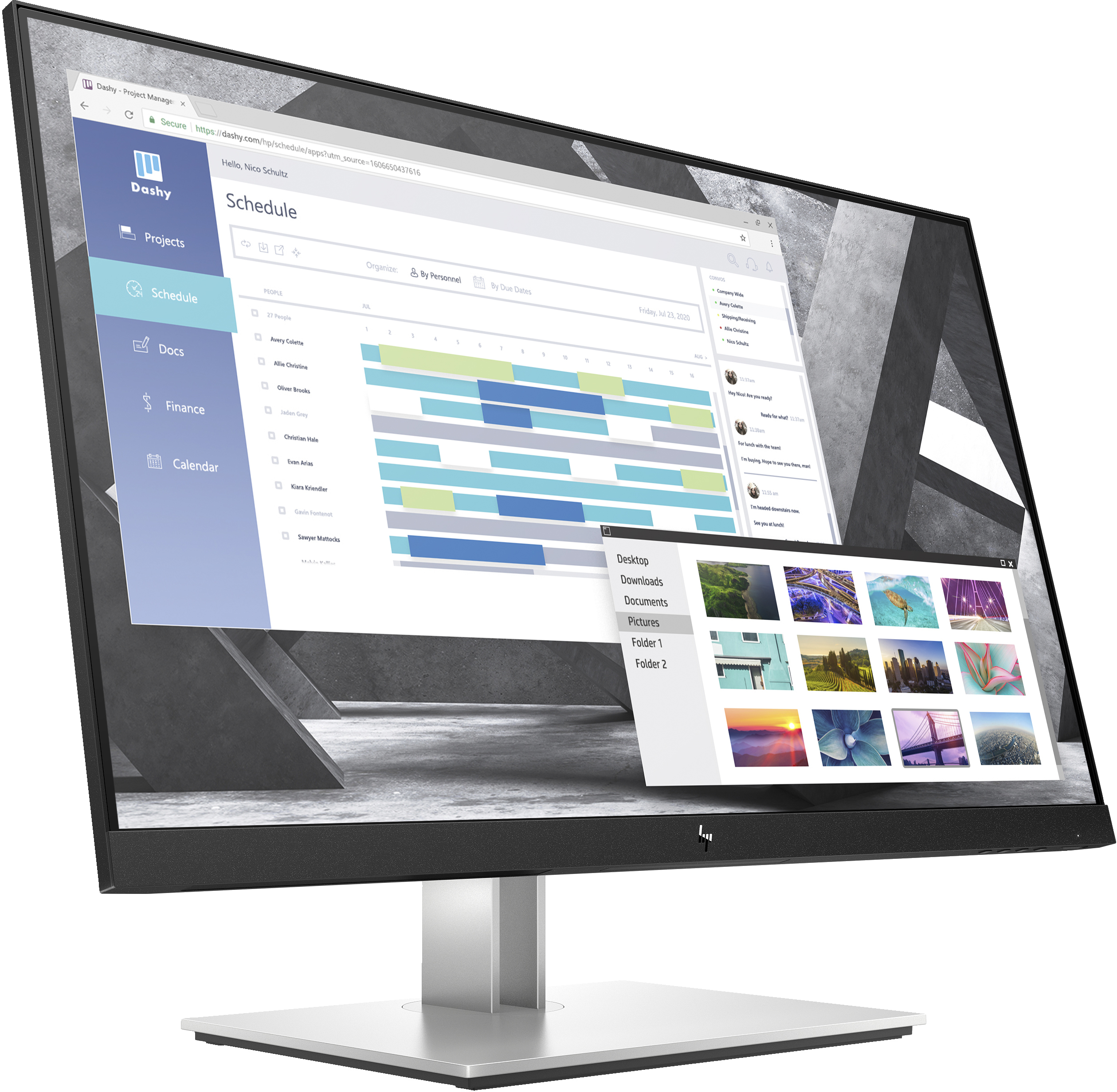 A computer monitor displaying a schedule and file explorer. The monitor sits on a silver stand.