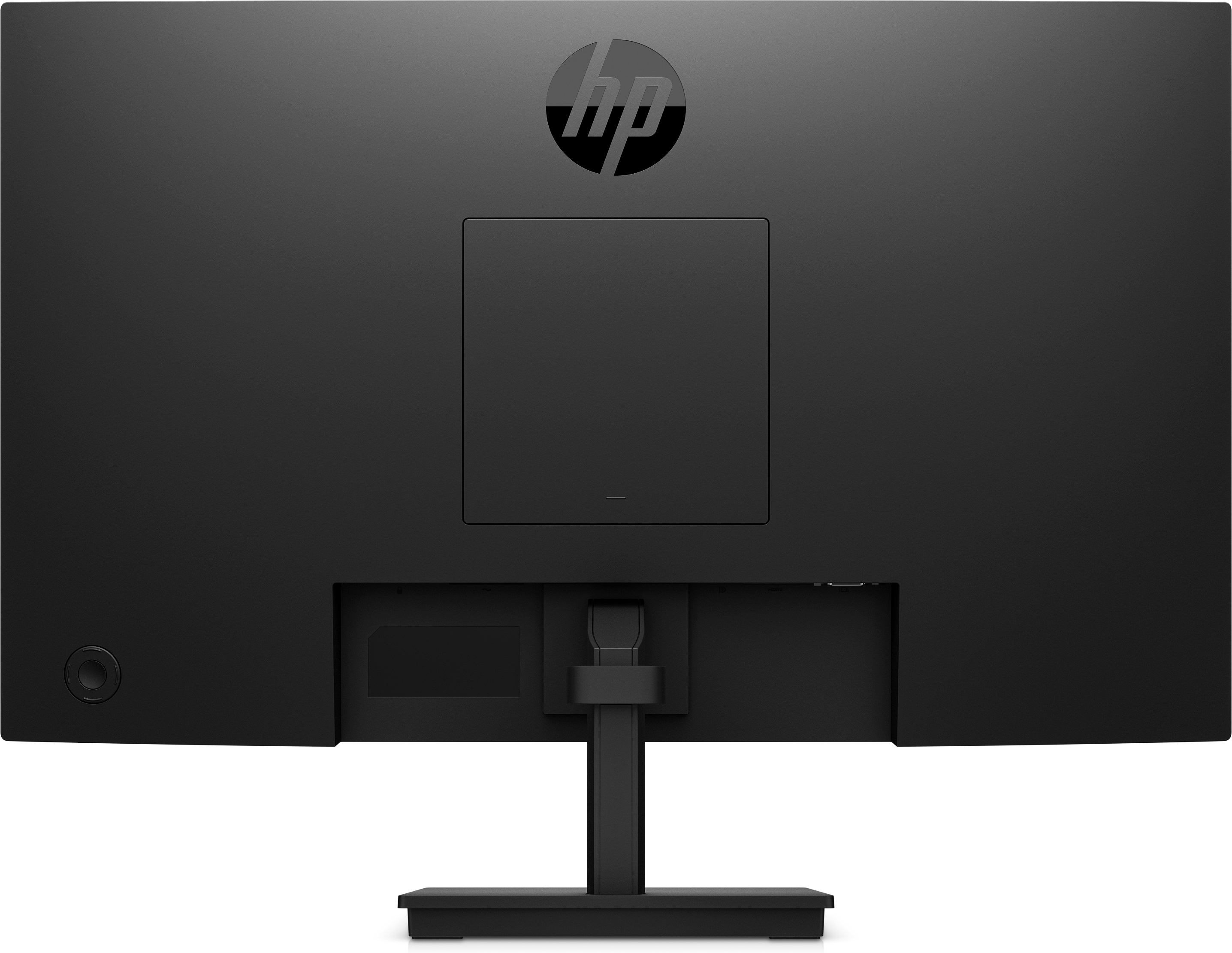 Vista trasera de un monitor negro. Cuenta con puerto de alimentación, puertos de conexión y fijación de soporte.