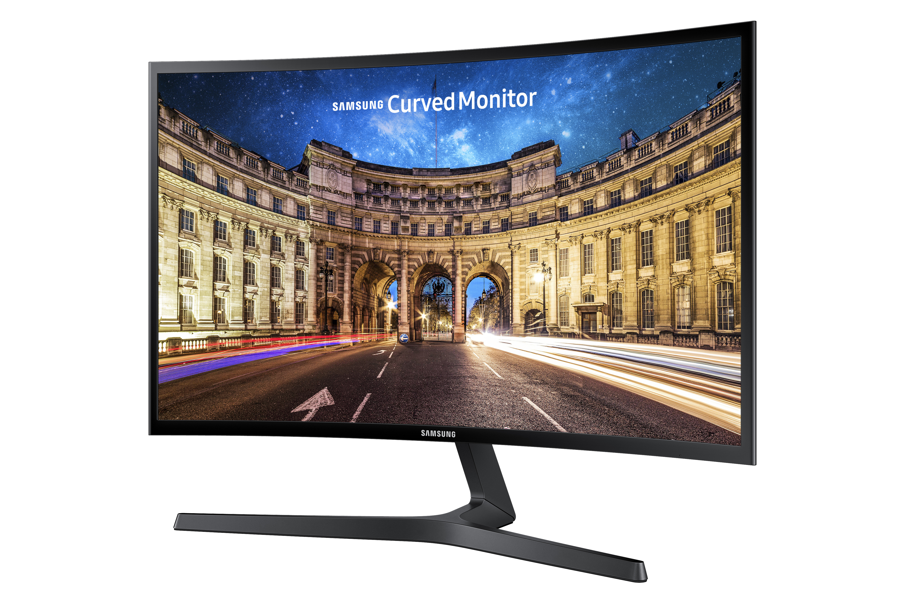 Monitor curvo Samsung che mostra un paesaggio urbano notturno.