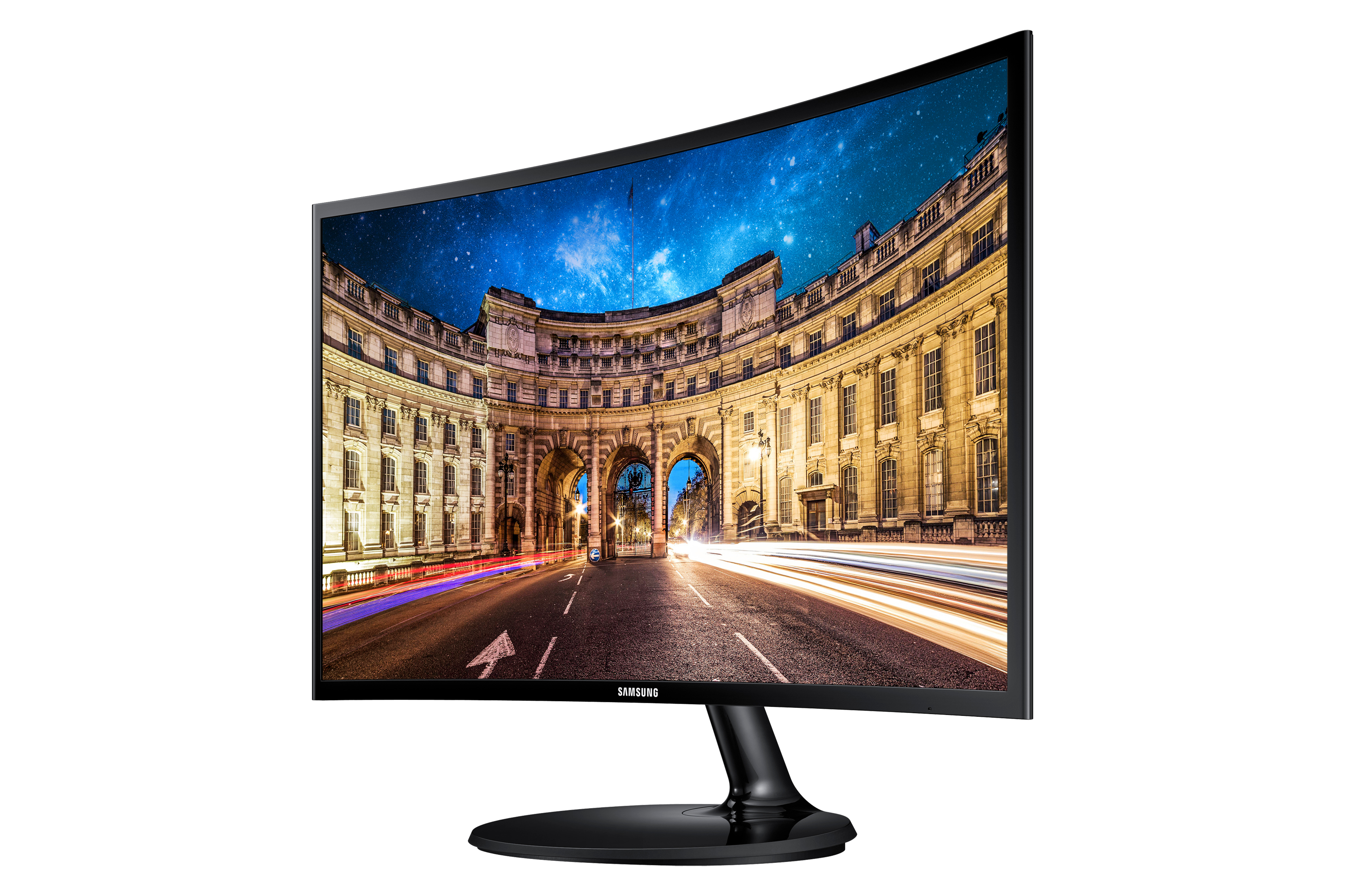 Monitor curvo con vista notturna della città. Il monitor è su un supporto nero.