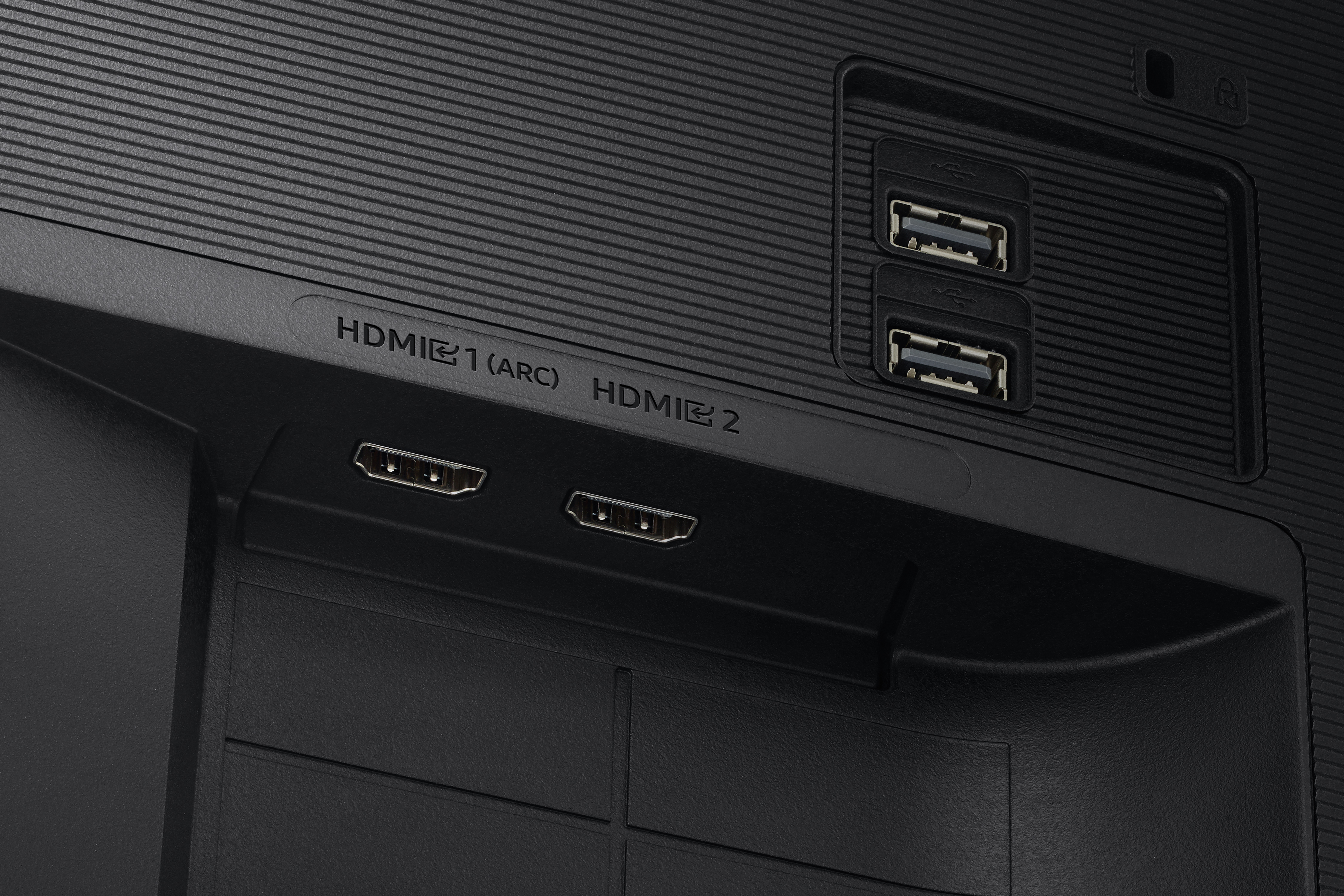 Porte del monitor, HDMI e USB. Parte posteriore nera. Sfondo bianco.