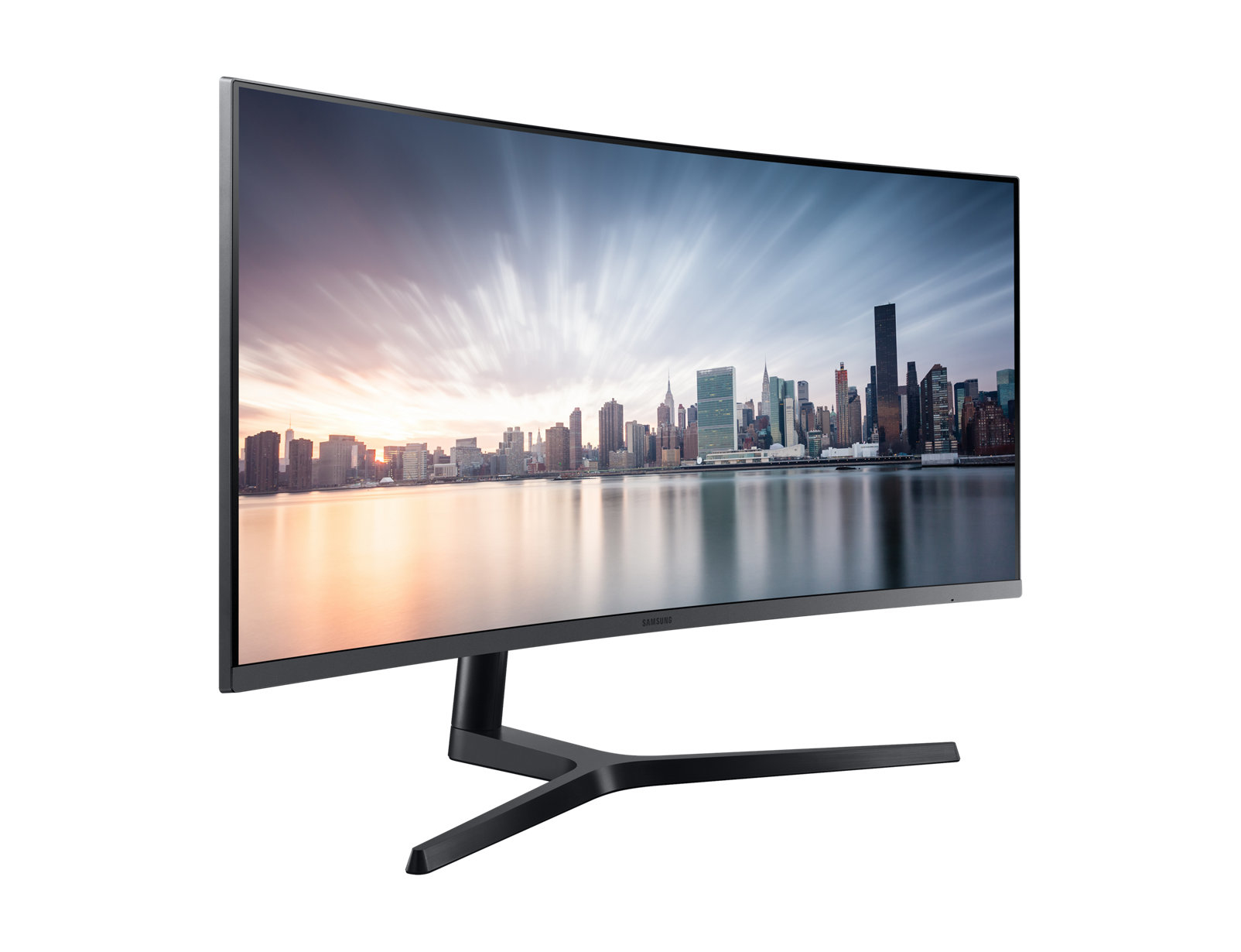 Monitor curvo que muestra un horizonte de la ciudad sobre el agua.
