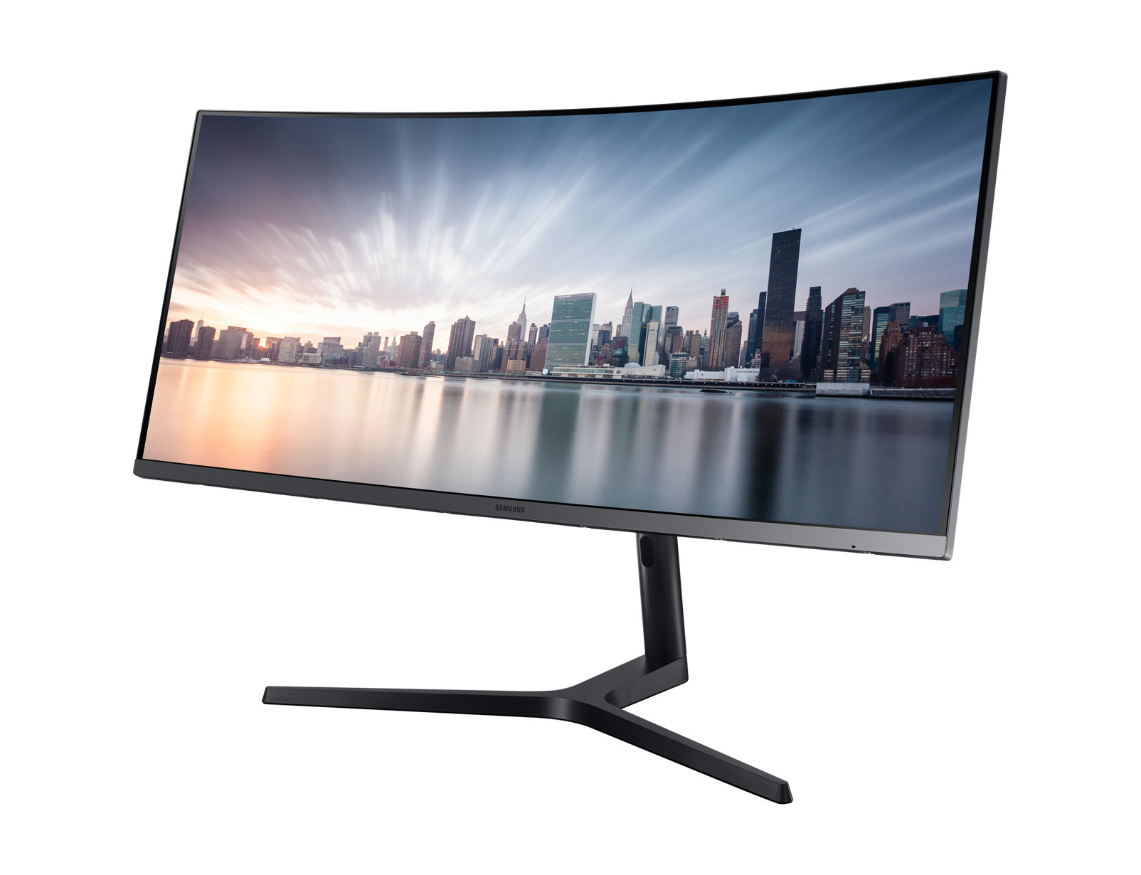 Monitor Samsung curvo muestra un horizonte de ciudad. Soporte negro, fondo blanco.