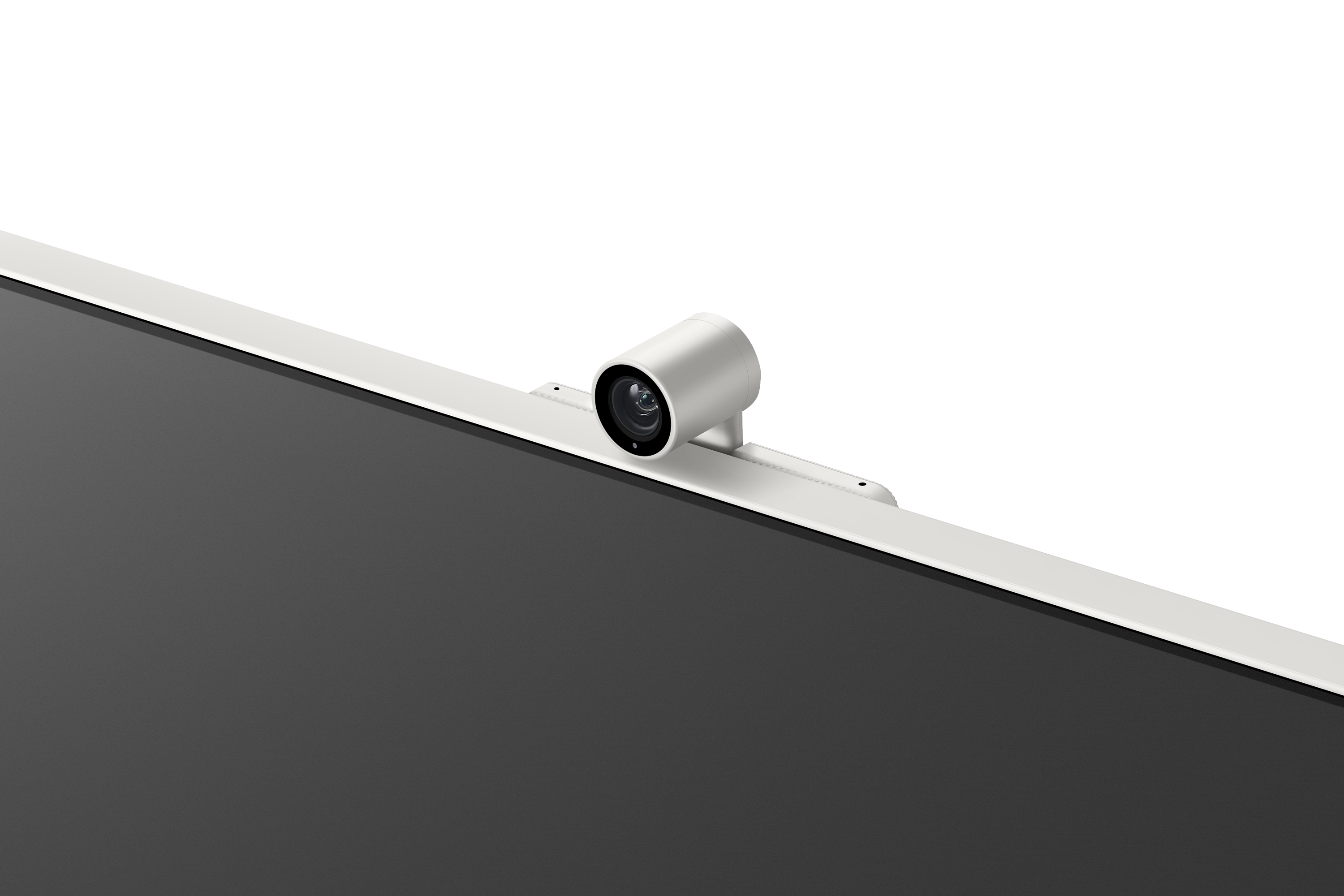 Webcam argentata sopra un monitor nero. L'obiettivo è centrato.