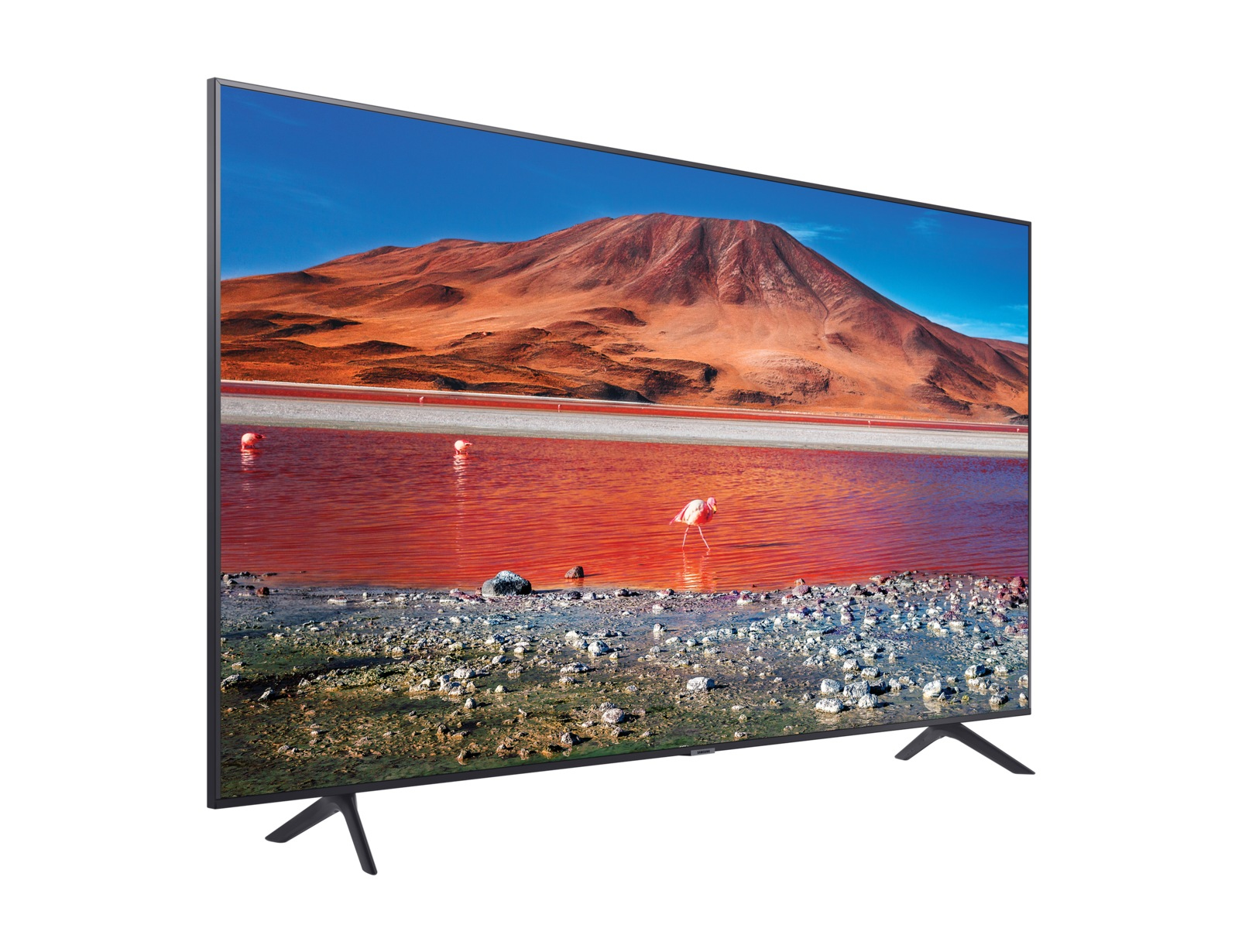 TV mostra paesaggio con acqua rossa, montagne e fenicotteri.