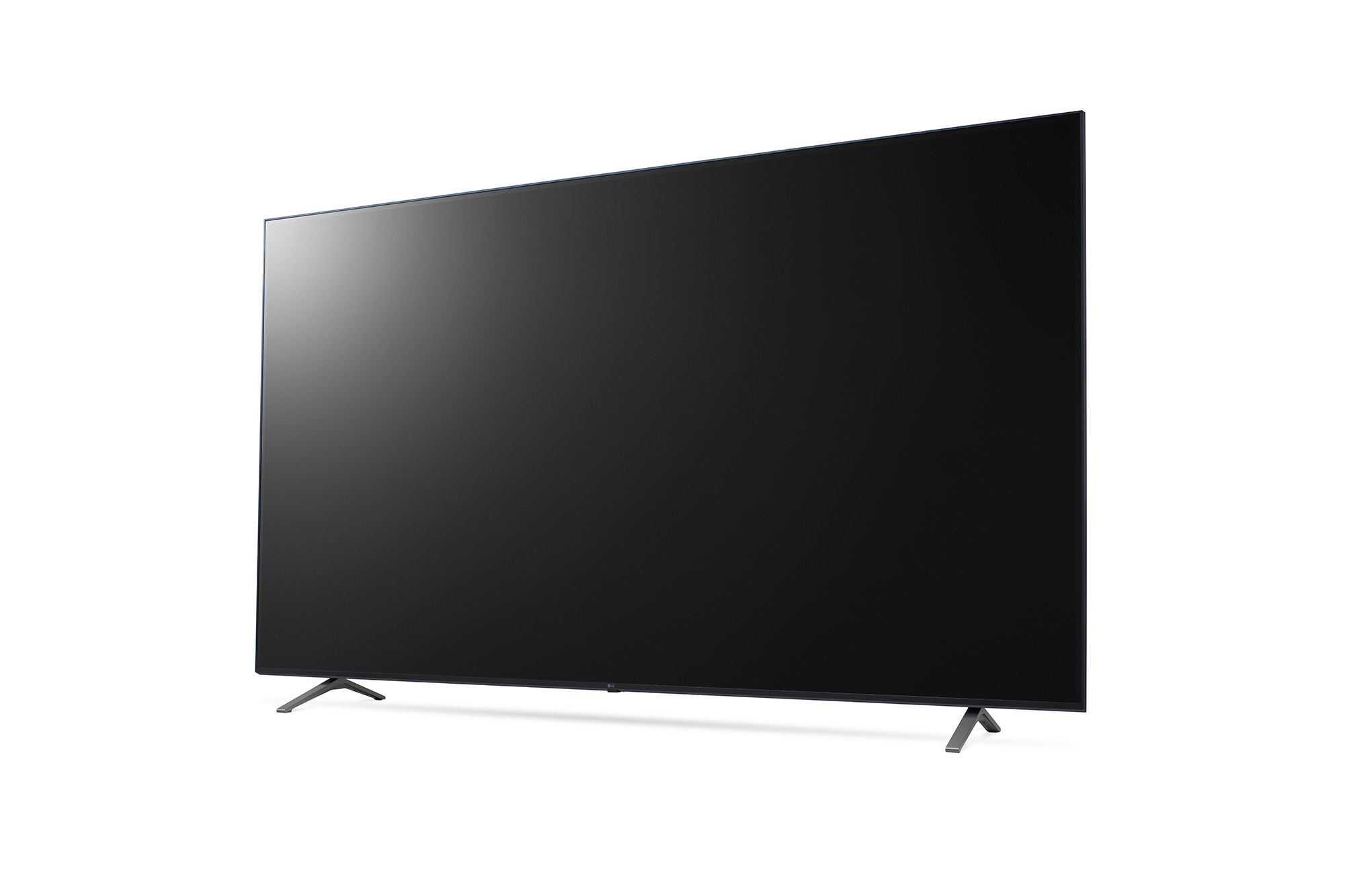 Een grote, zwarte LG TV staat op twee poten. Het scherm is donker.