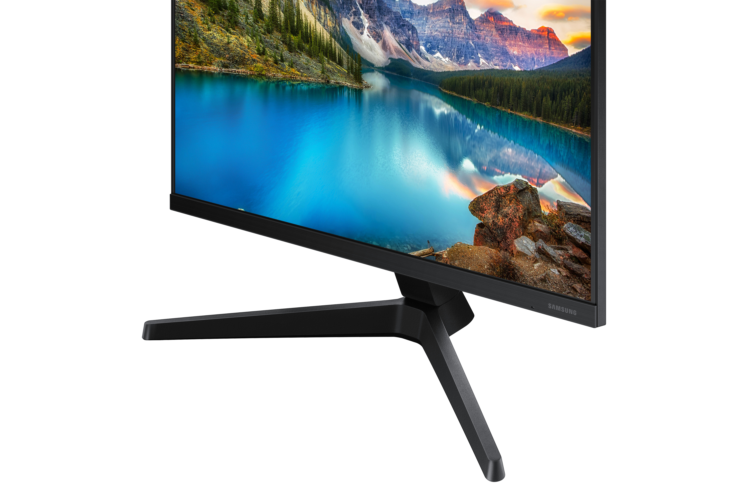 Monitor con una escena de lago de montaña. El soporte tiene patas negras. La pantalla es negra.