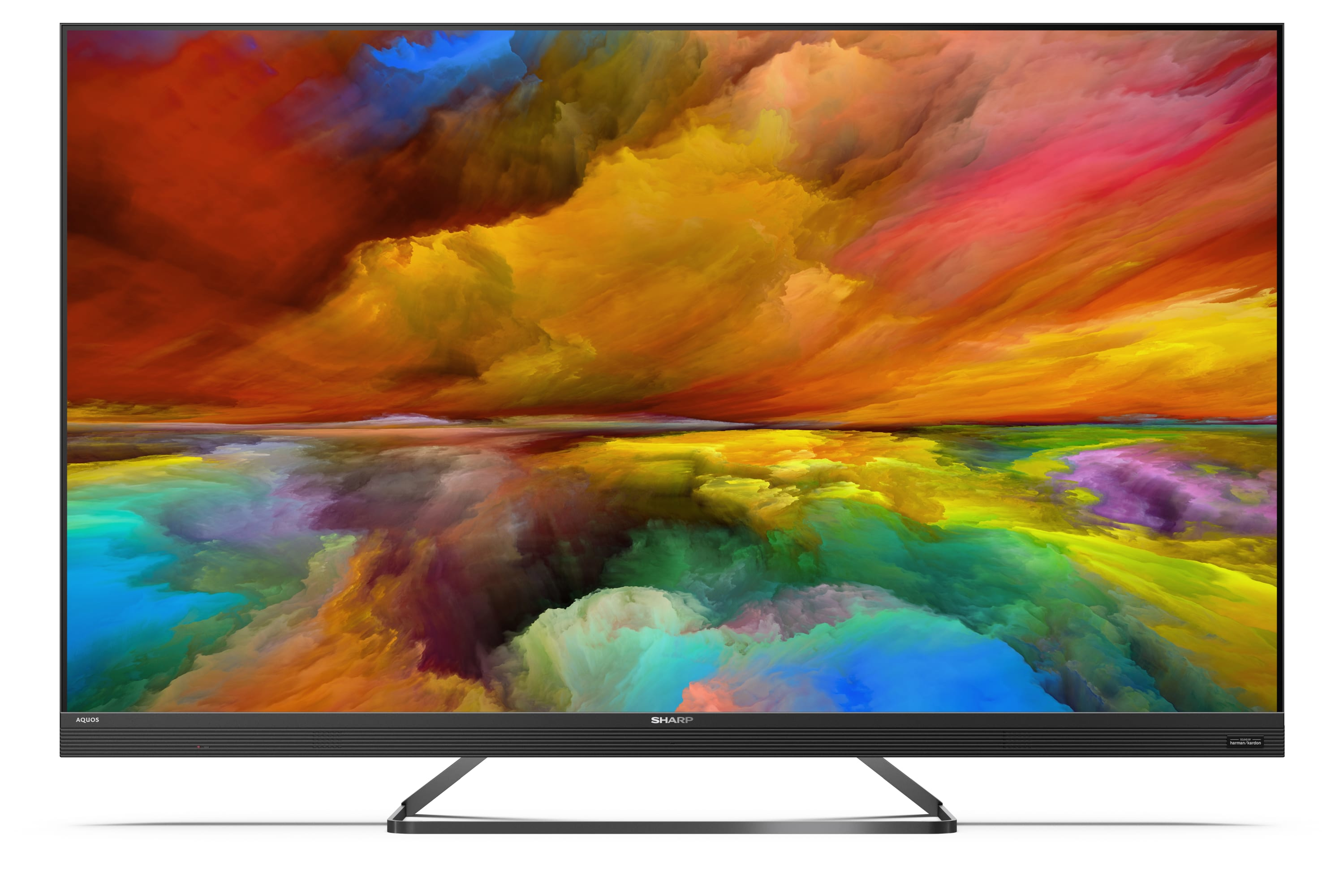 Ein großer, schwarzer Fernseher mit einem farbenfrohen, abstrakten Bild auf dem Bildschirm. Schwarzer Standfuß.
