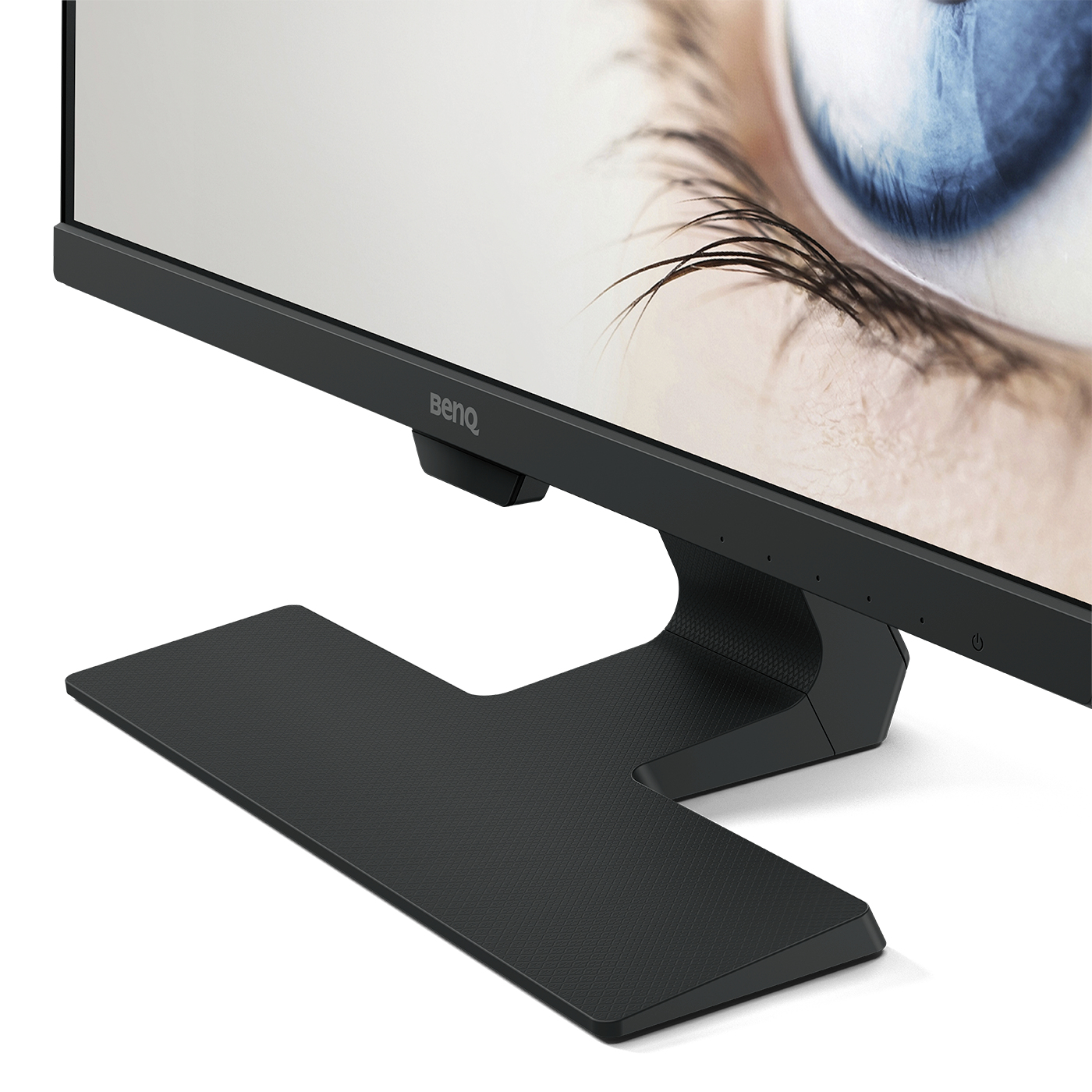 Un monitor nero con supporto nero. Lo schermo mostra un primo piano di un occhio blu.