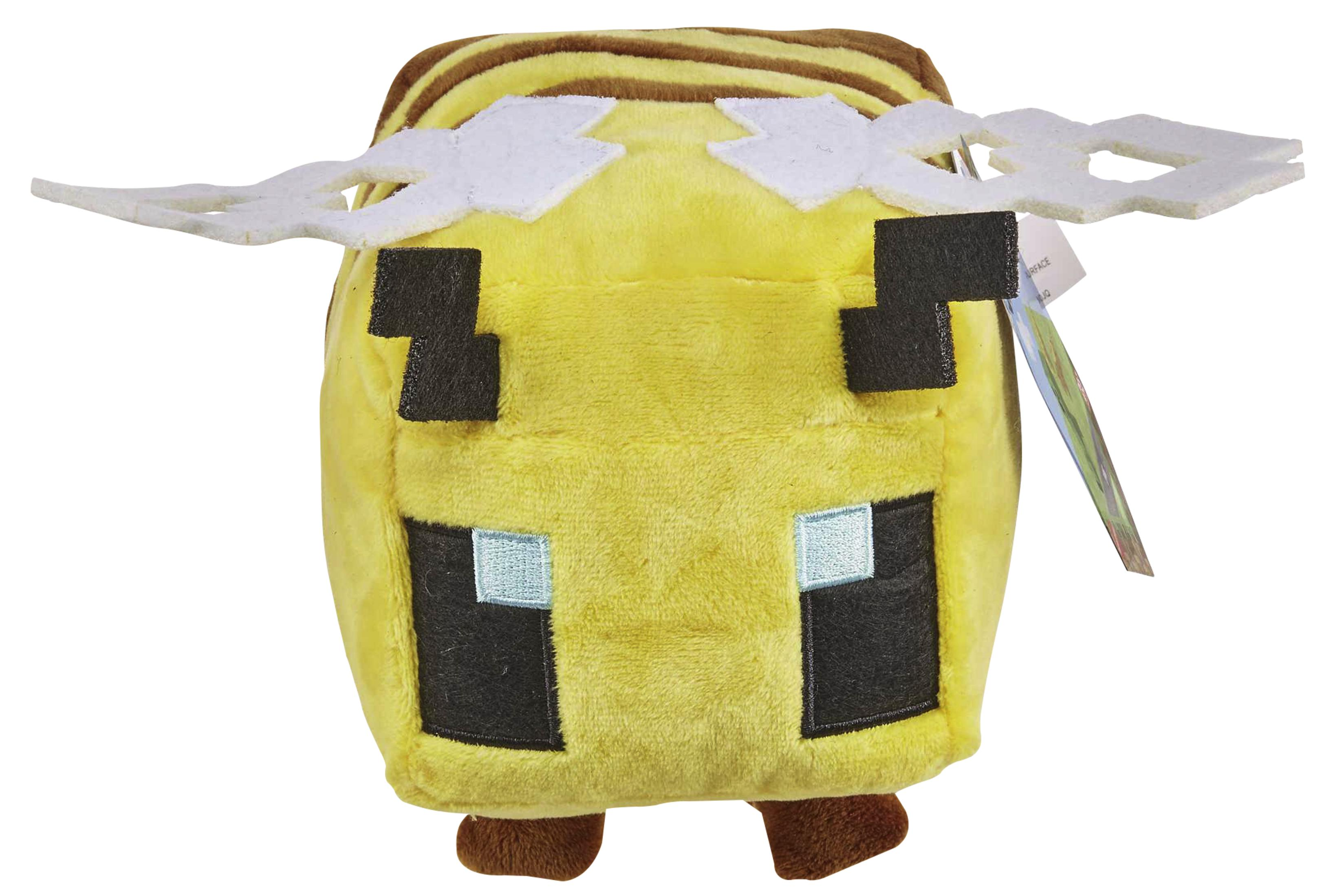 Gelbes Minecraft-Bienen-Plüschtier mit weißen Flügeln, schwarzen Augen und braunen Streifen auf dem Kopf.