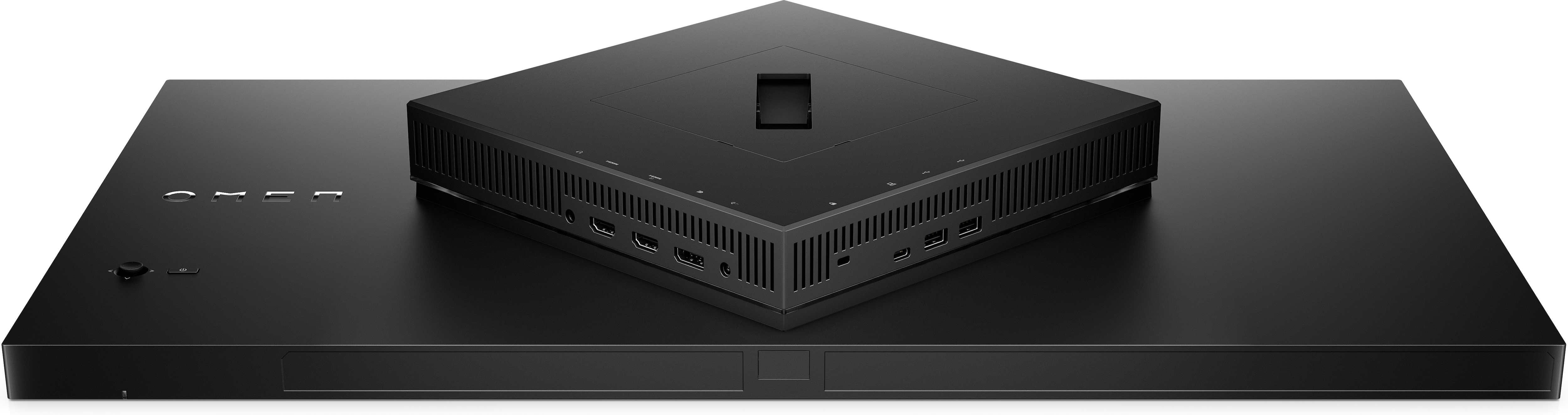 Czarna podstawa monitora z wieloma portami i centralnym stojakiem. Górna część ma porty HDMI i USB.