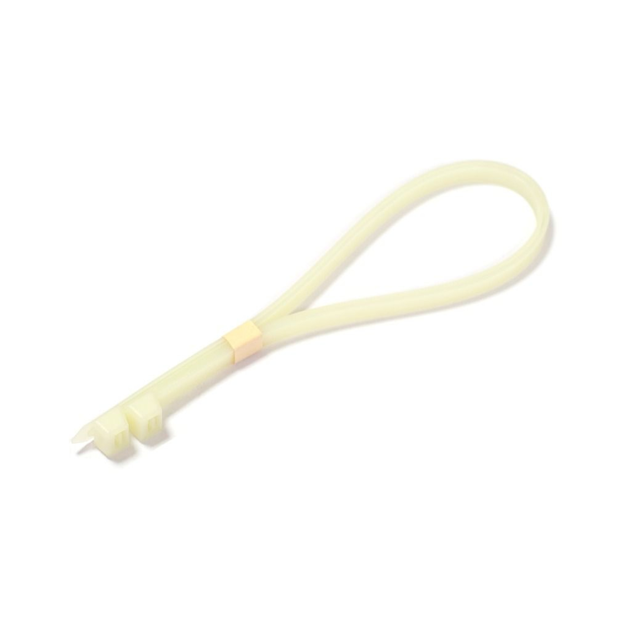 Uno strumento giallo pallido con un anello. Ha un piccolo pezzo beige rettangolare e due rebbi.