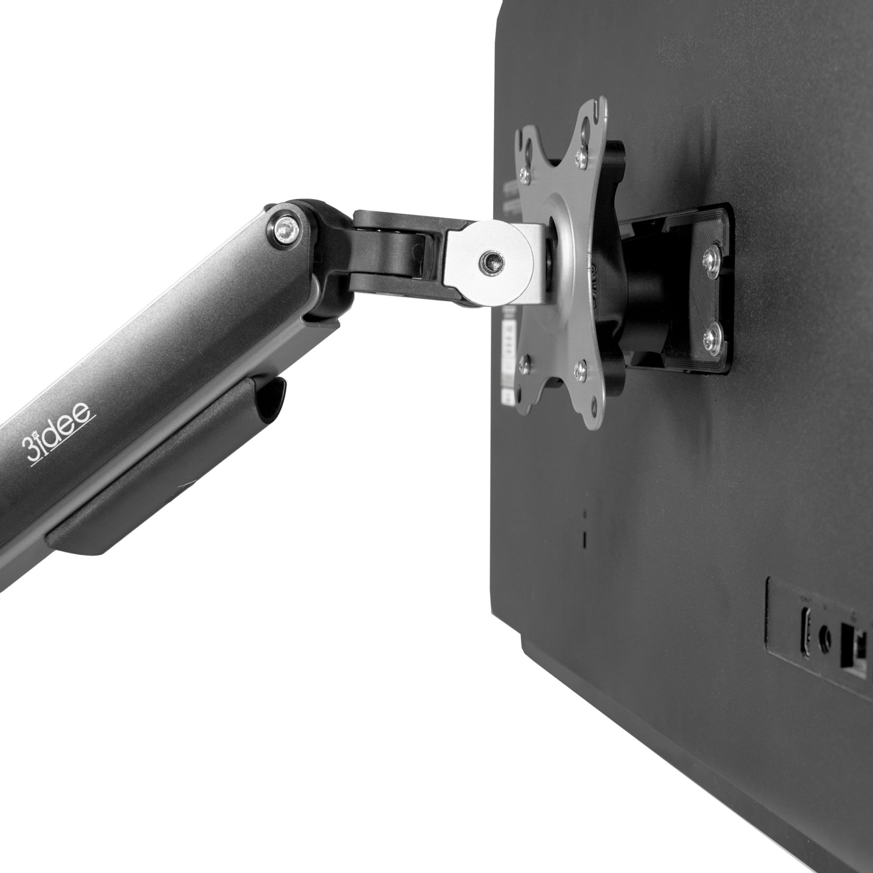 Monitorarm an der Rückseite eines schwarzen Monitors befestigt. Der Arm ist grau und trägt den Markennamen 3idee.
