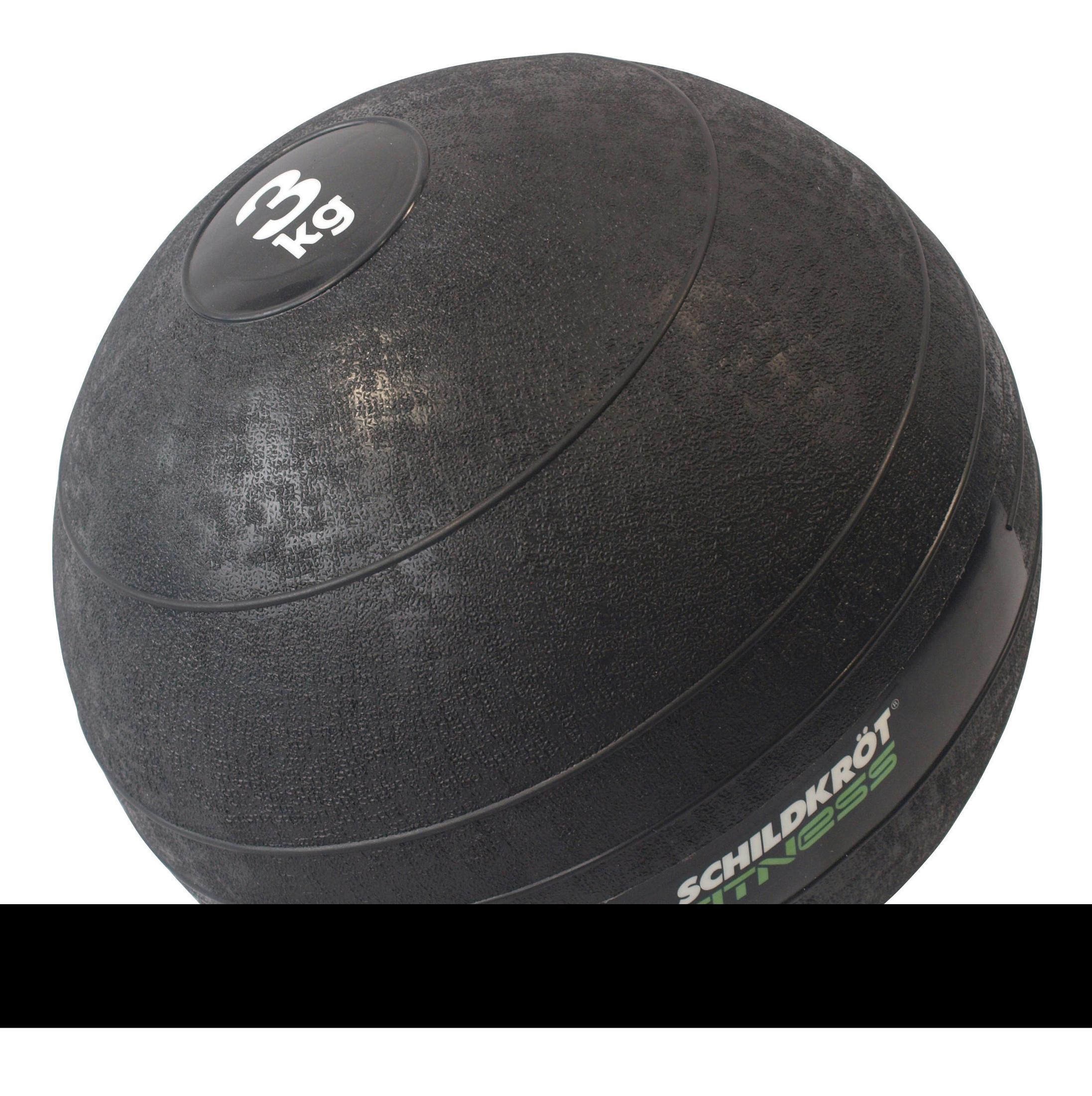 Balle de frappe noire avec logo vert Schildkröt Fitness. Fond blanc.